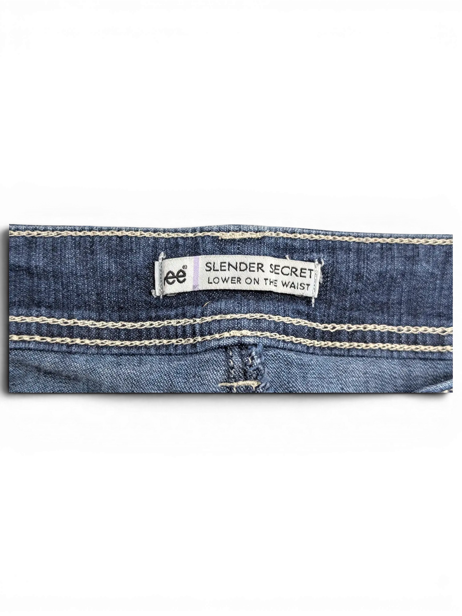 JAKE & IPI Lee Slender Secret jeans back waistband label with contrast stitching on dark blue denim fabric