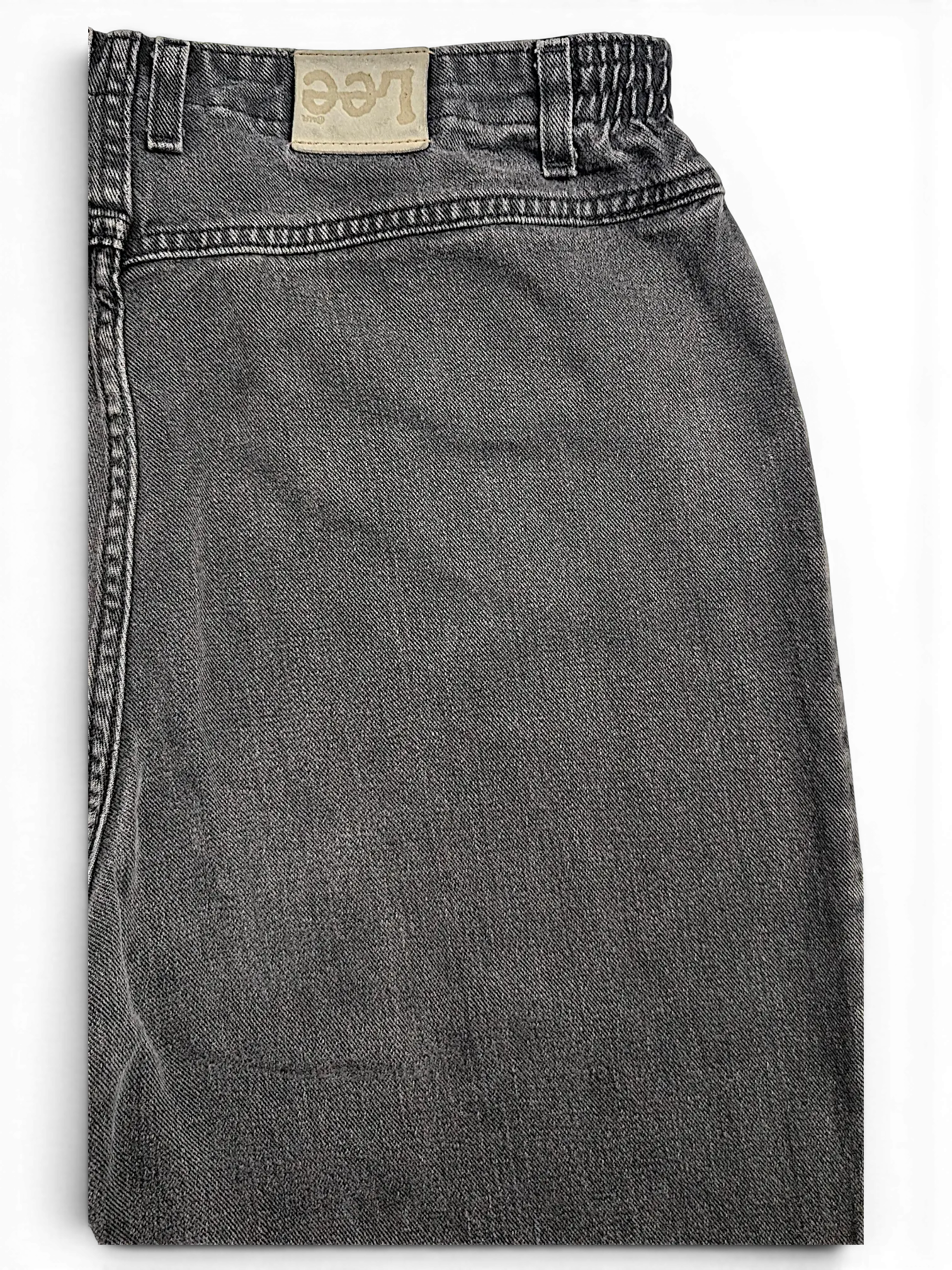 JAKE & IPI Lee stretch waist jeans in washed black denim with a leather brand patch on the back waistband.