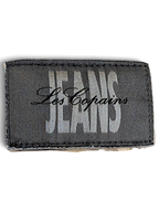 JAKE & IPI Les Copains Jeans brand clothing label in black and white