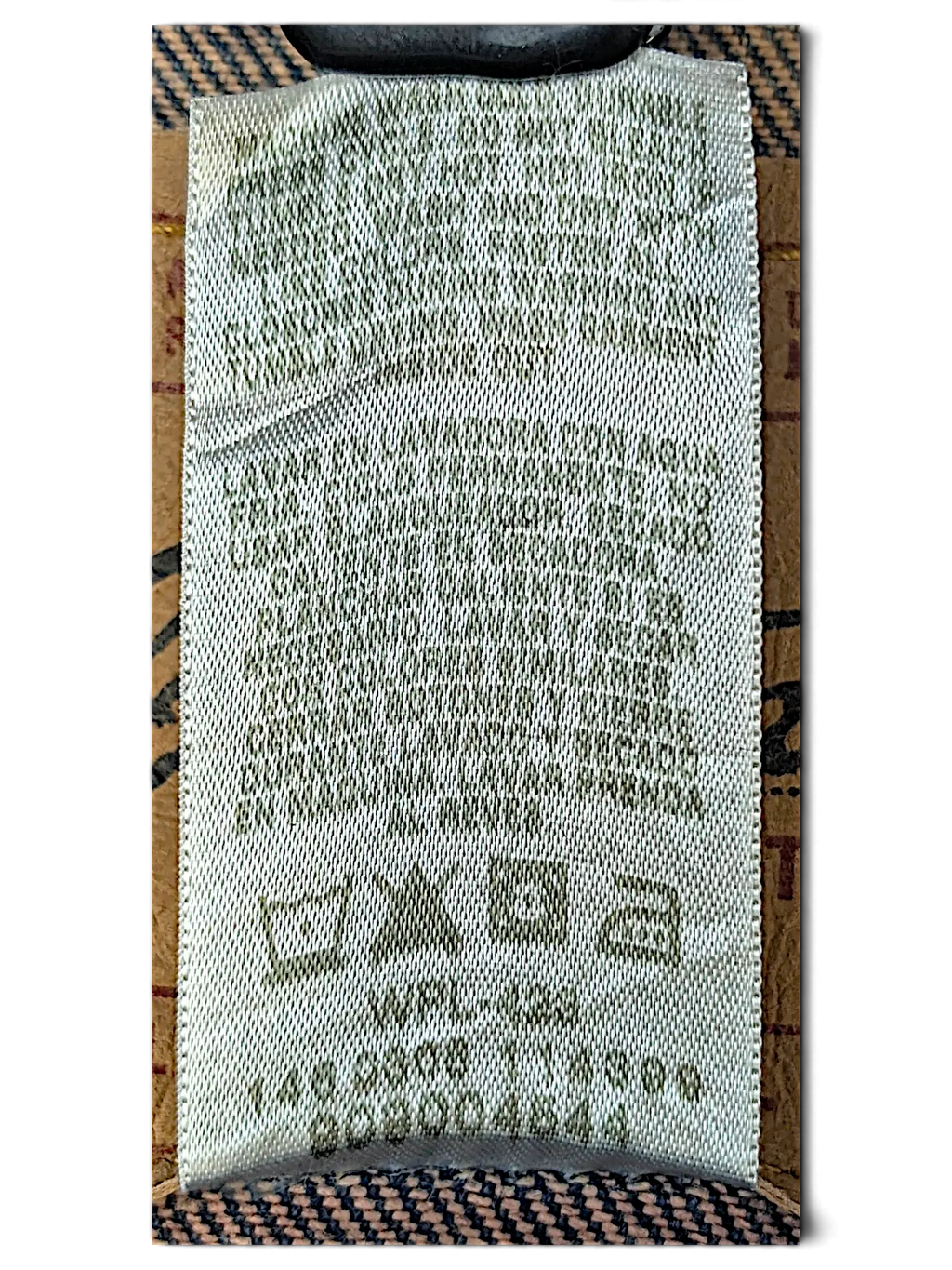JAKE & IPI Levi Strauss Signature denim jacket care label with washing instructions and WPL-423 code