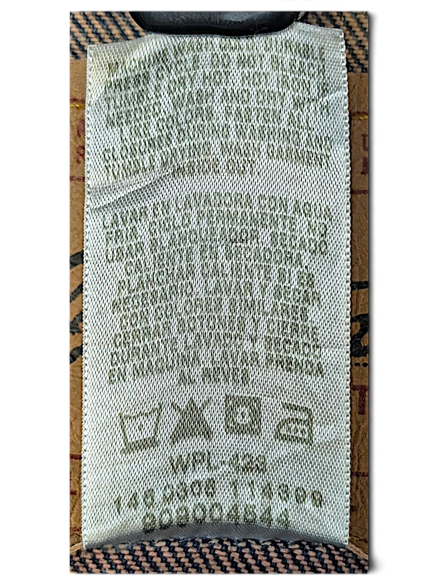 JAKE & IPI Levi Strauss Signature denim jacket care label with washing instructions and WPL-423 code