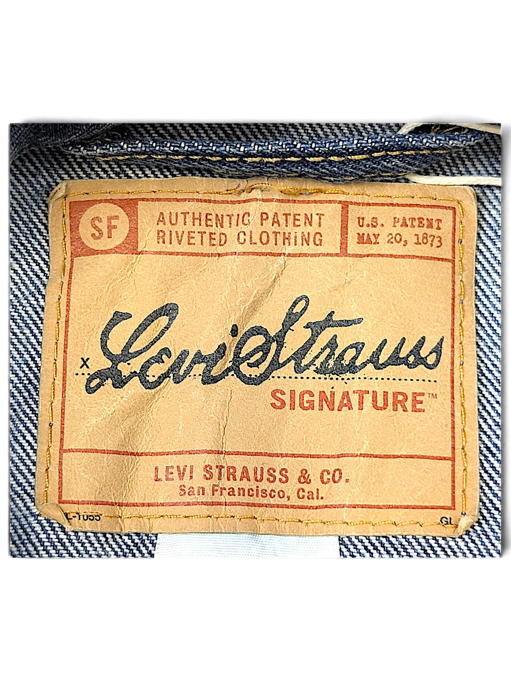 JAKE & IPI Levi Strauss Signature dark blue denim jacket interior brand label with tan leather patch