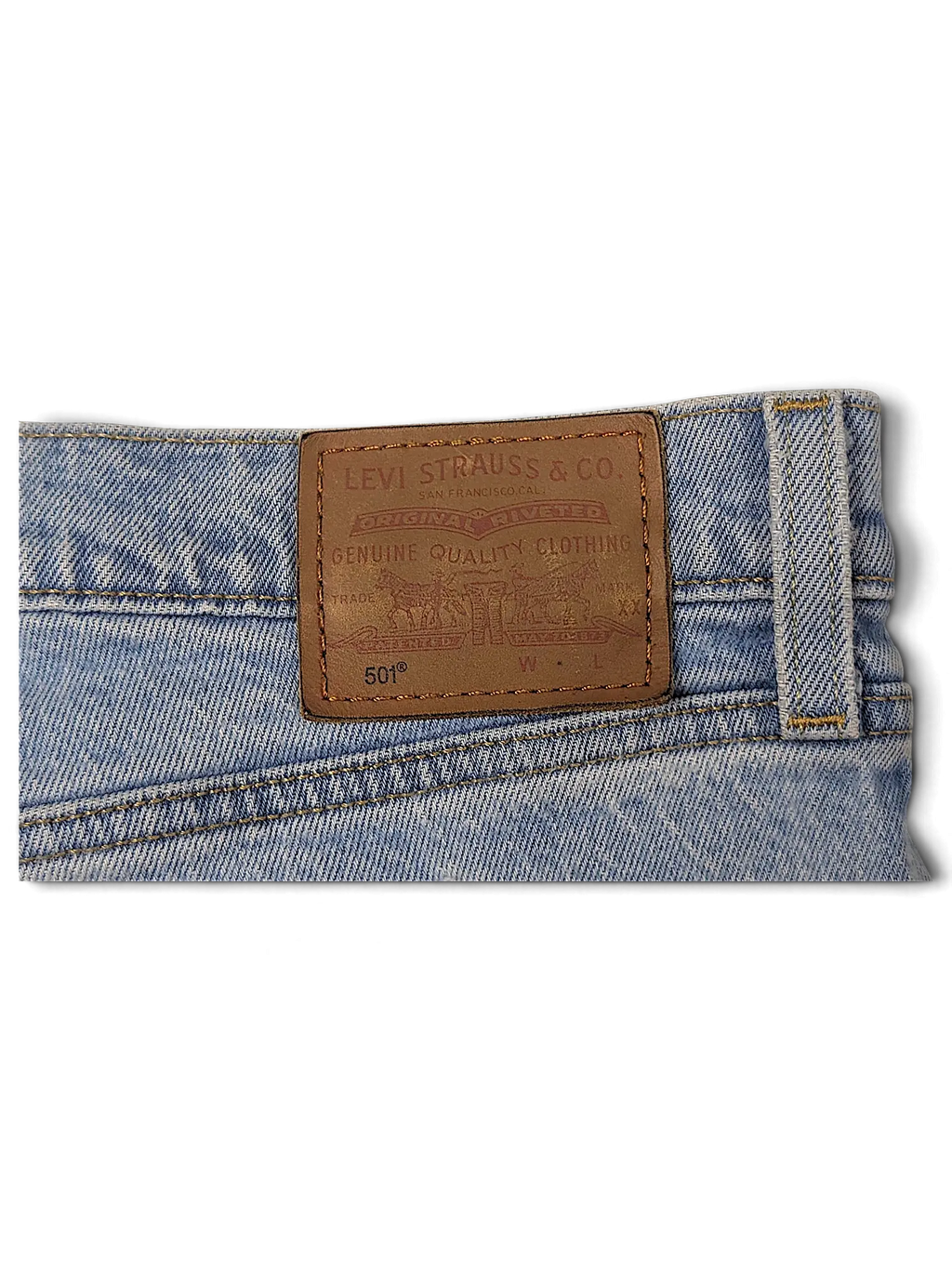 JAKE & IPI Levi's 501 20W light wash denim jeans featuring a classic brown leather brand patch on the waistband.