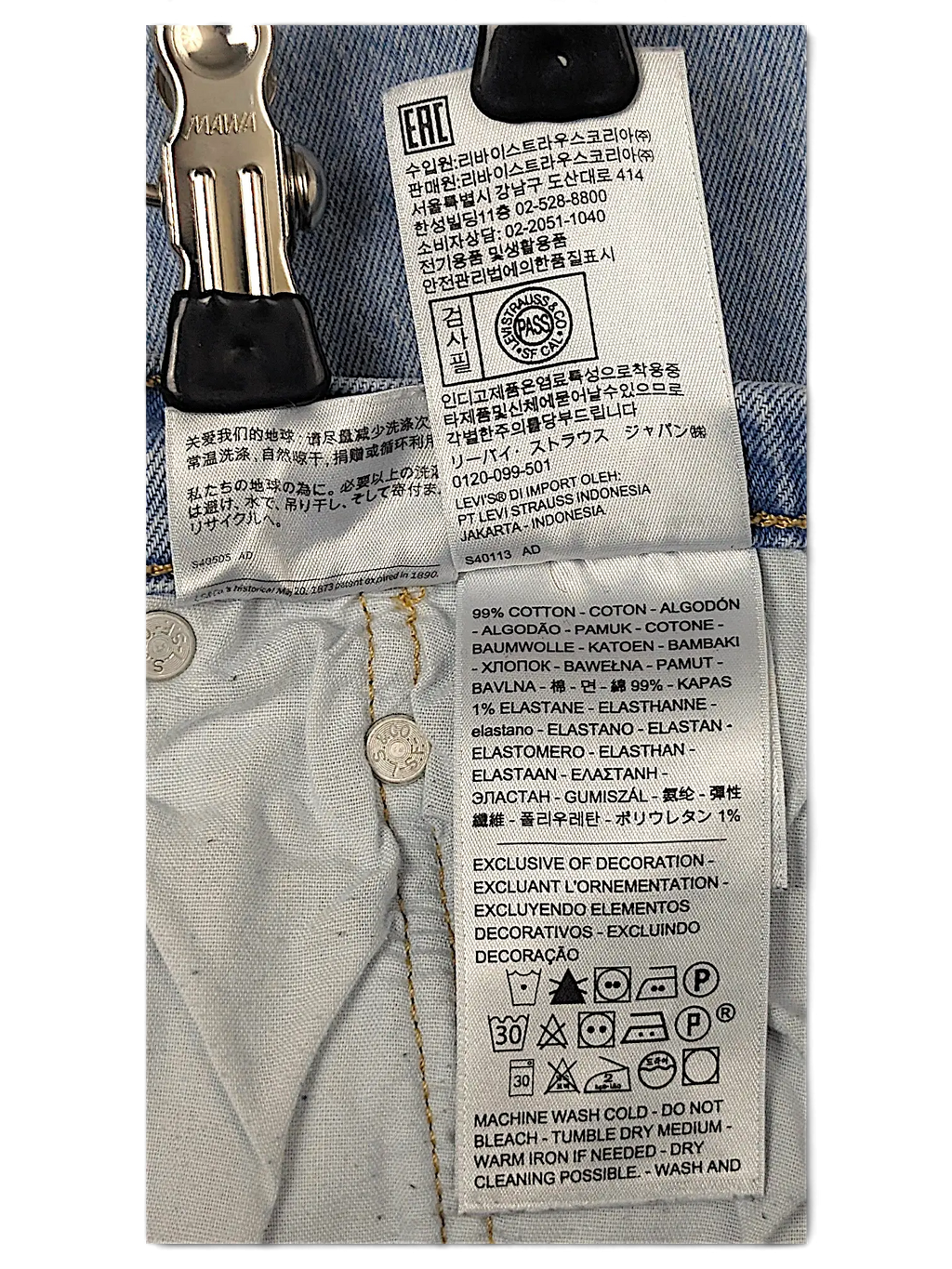 JAKE & IPI Levi's 501 20W jeans interior care label showing 99% cotton and 1% elastane fabric composition