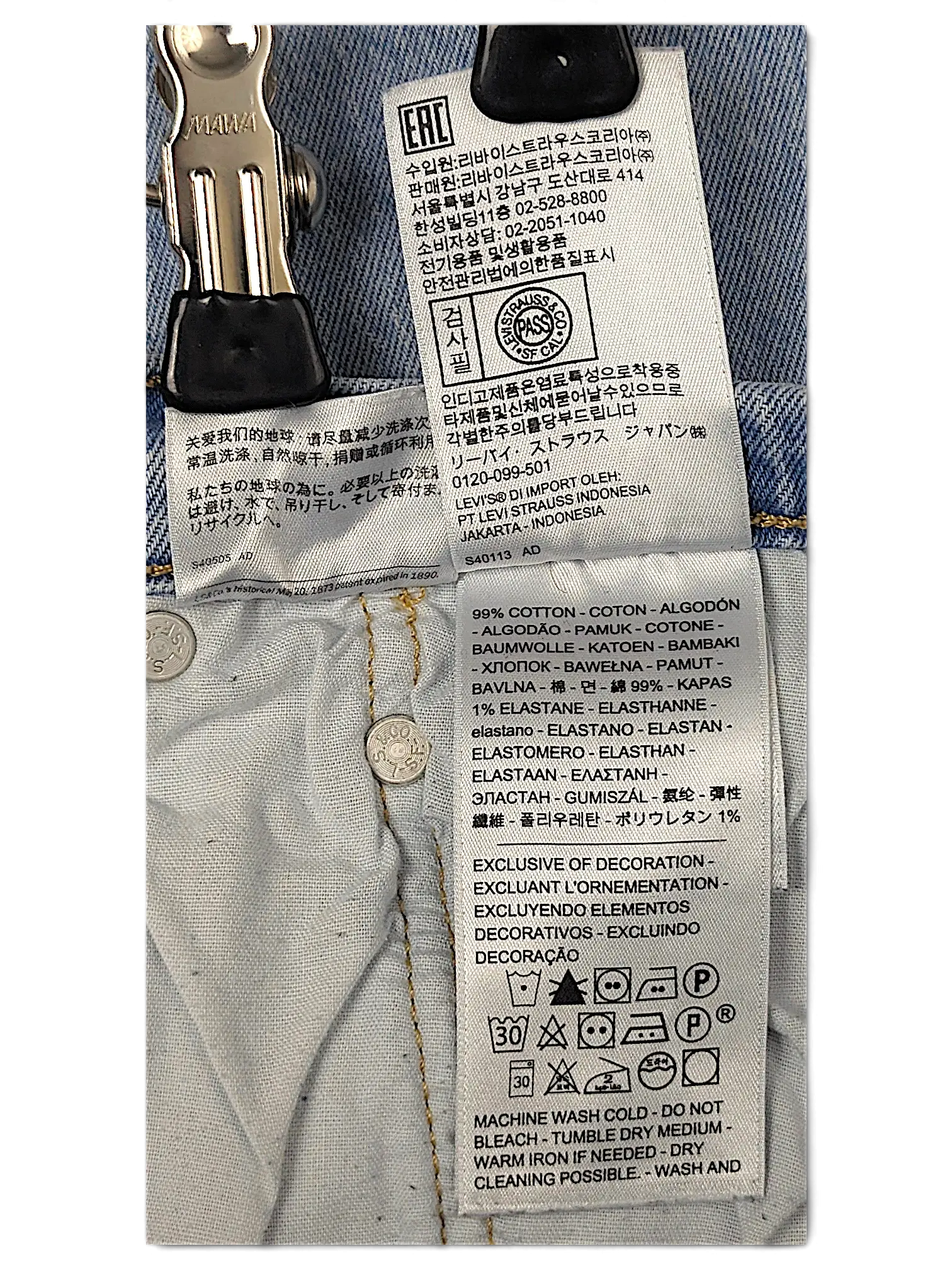 JAKE & IPI Levi's 501 20W jeans interior care label showing 99% cotton and 1% elastane fabric composition