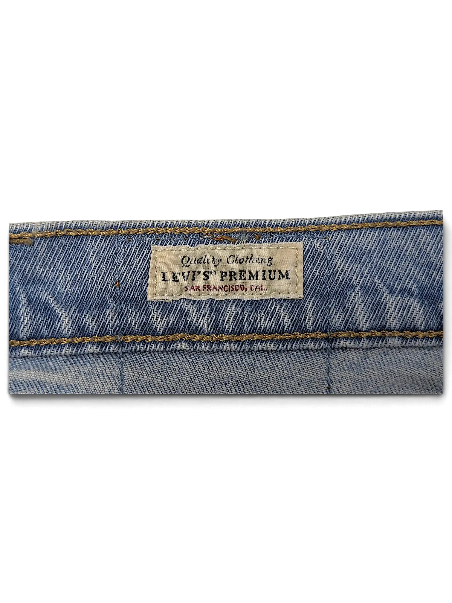 JAKE & IPI Levi's 501 20W jeans featuring a Levi's Premium interior waistband label on light wash denim fabric.