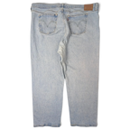 JAKE & IPI Levi's 501 20W vaaleat farkut klassisella viisitaskumallilla ja nahkaisella takamerkillä.