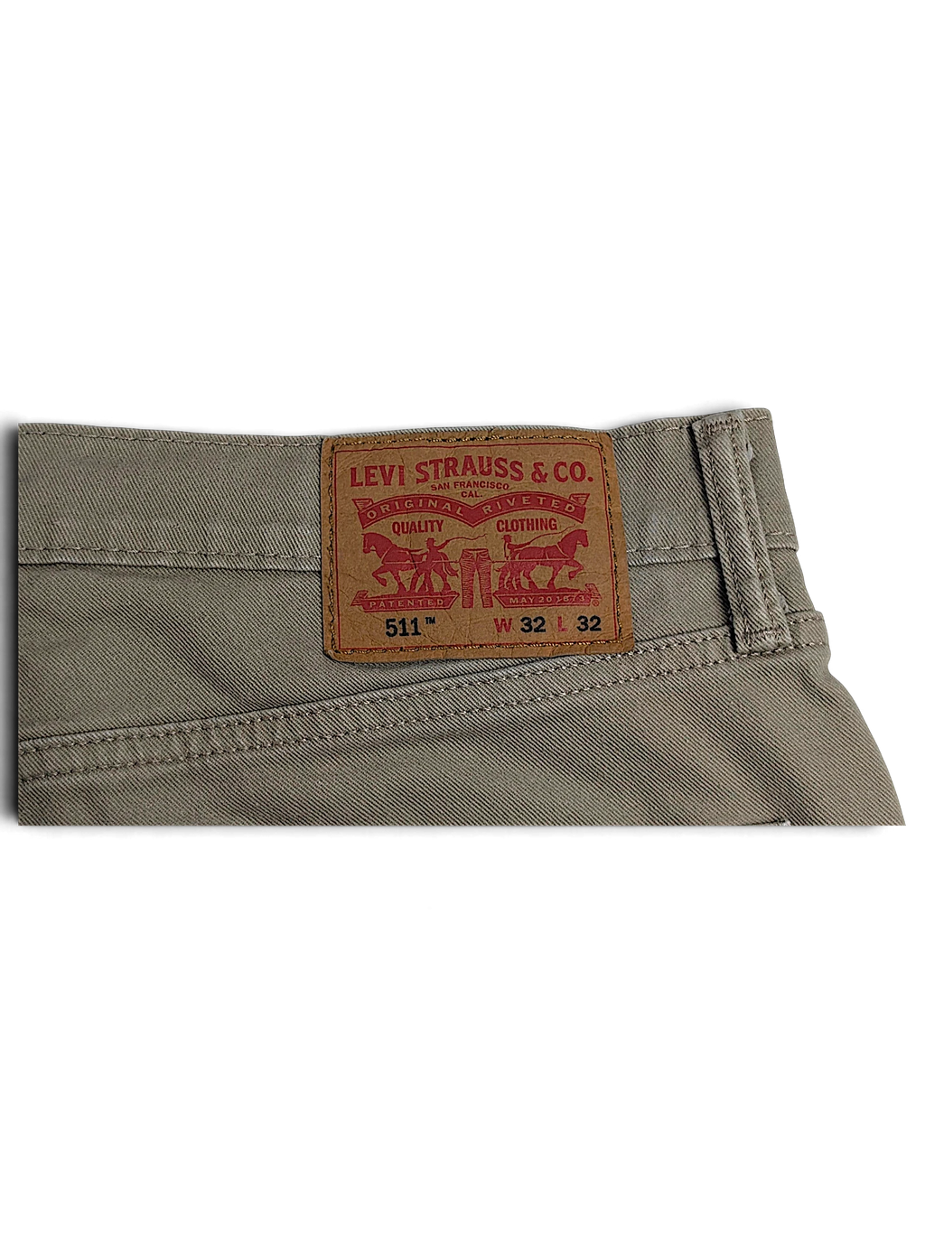 JAKE & IPI Levi’s 511 beige slim jeans featuring the iconic leather back patch with size W32 L32 details