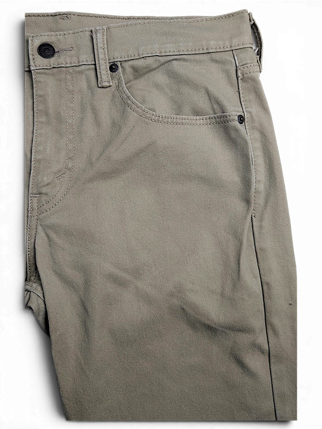 JAKE & IPI pre-owned Levi’s 511 slim fit jeans in beige stretch cotton denim with classic five-pocket styling.
