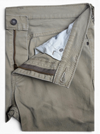 JAKE & IPI pre-owned Levi’s 511 slim fit beige stretch denim jeans featuring a classic zip fly and button closure.