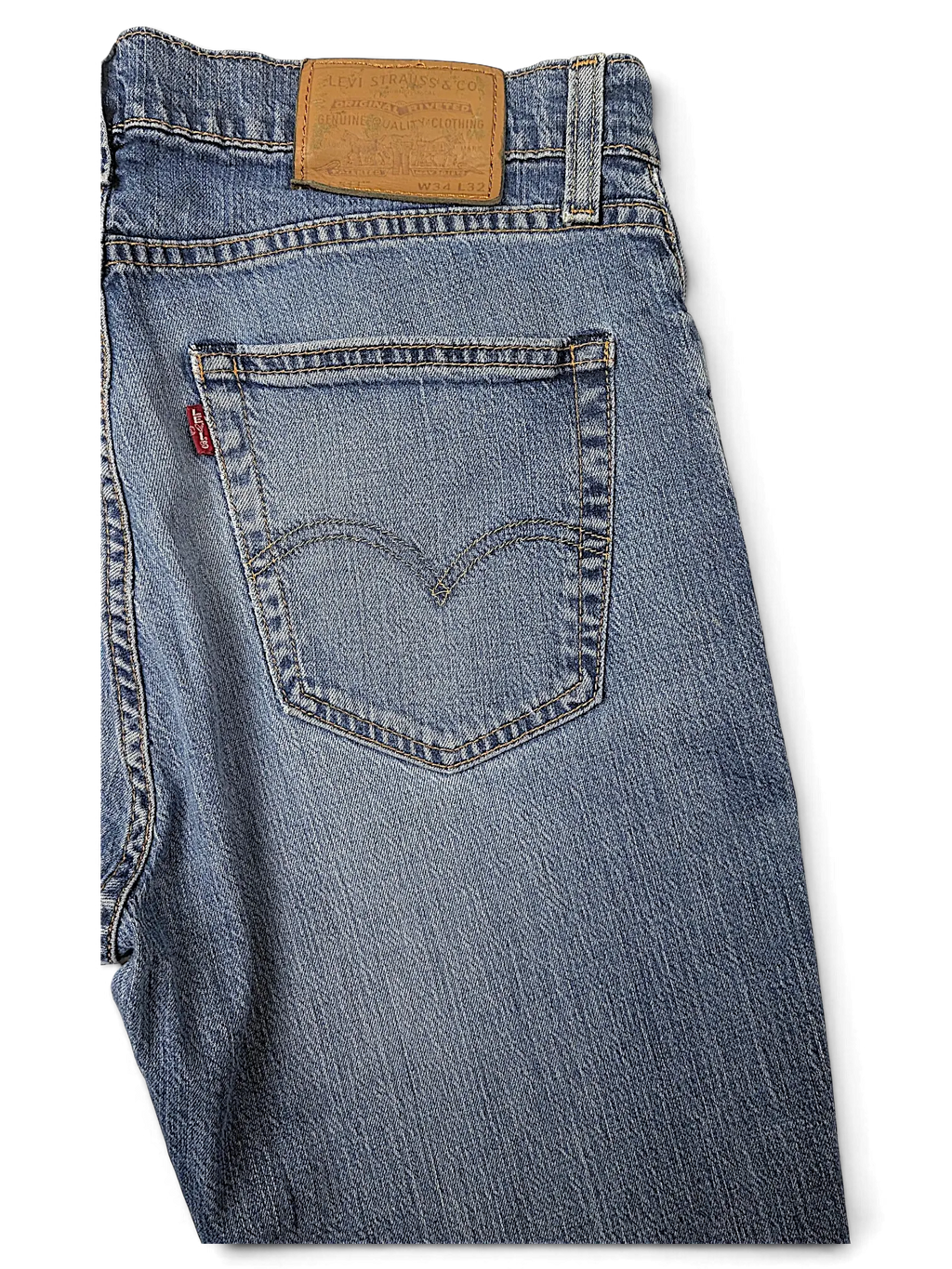 JAKE & IPI Levi's 511 blue denim jeans featuring a classic five-pocket design and leather back waist patch.