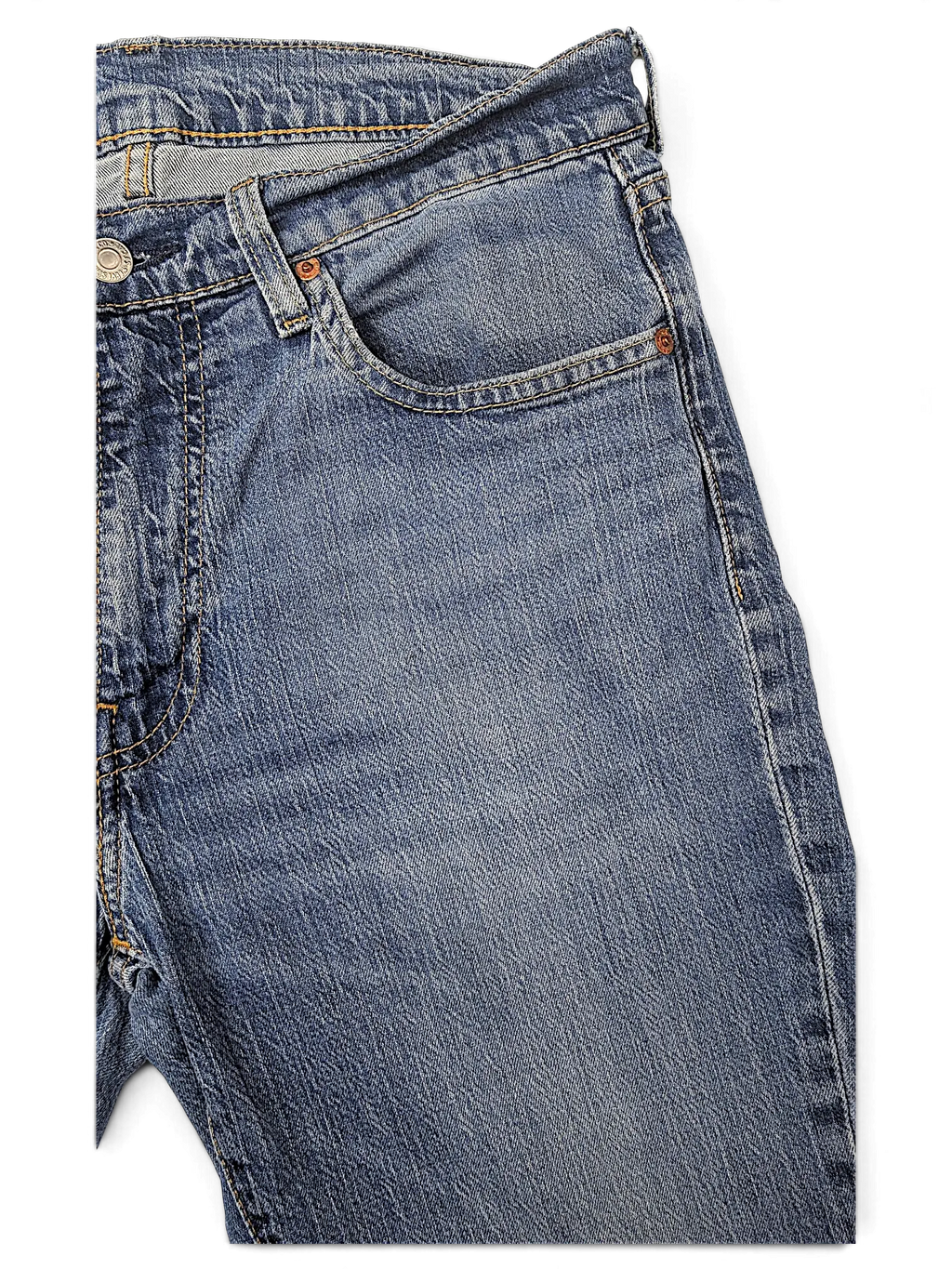 JAKE & IPI Levi's 511 blue denim jeans featuring a classic five-pocket construction and copper rivets.