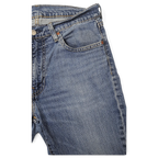 JAKE & IPI Levi's 511 siniset farkut klassisella viisitaskurakenteella ja kupariniiteillä.
