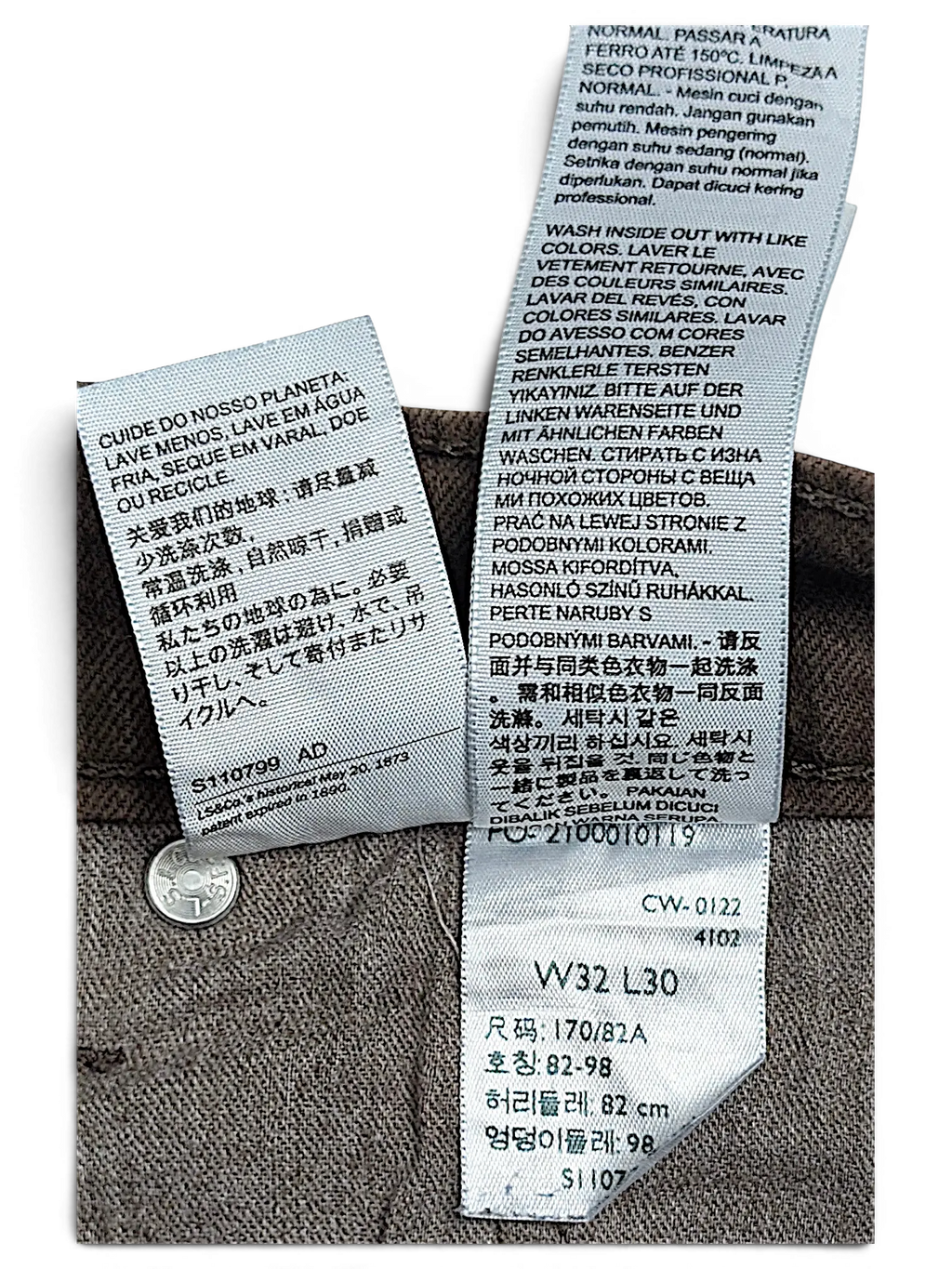 JAKE & IPI Levi's 511 brown jeans interior care label and size tag showing W32 L30