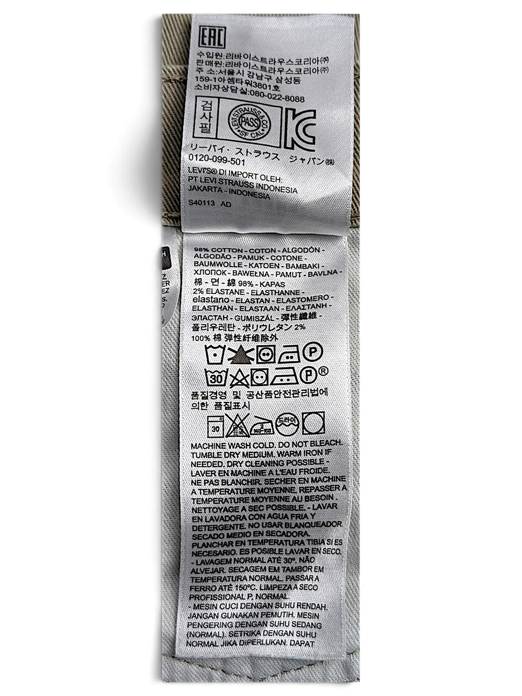 JAKE & IPI Levi’s 511 slim jeans care label showing material composition and washing instructions in multiple languages