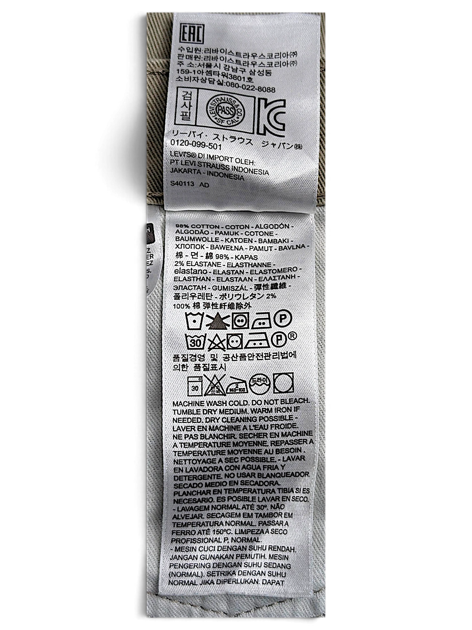 JAKE & IPI Levi’s 511 slim jeans care label showing material composition and washing instructions in multiple languages
