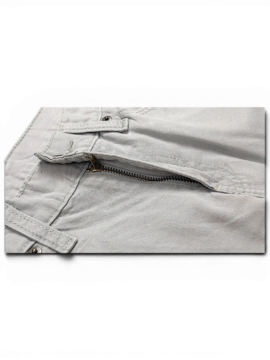 Close-up of JAKE & IPI Levi's 511 chino pants featuring a grey cotton fabric and metal zipper fly detail.