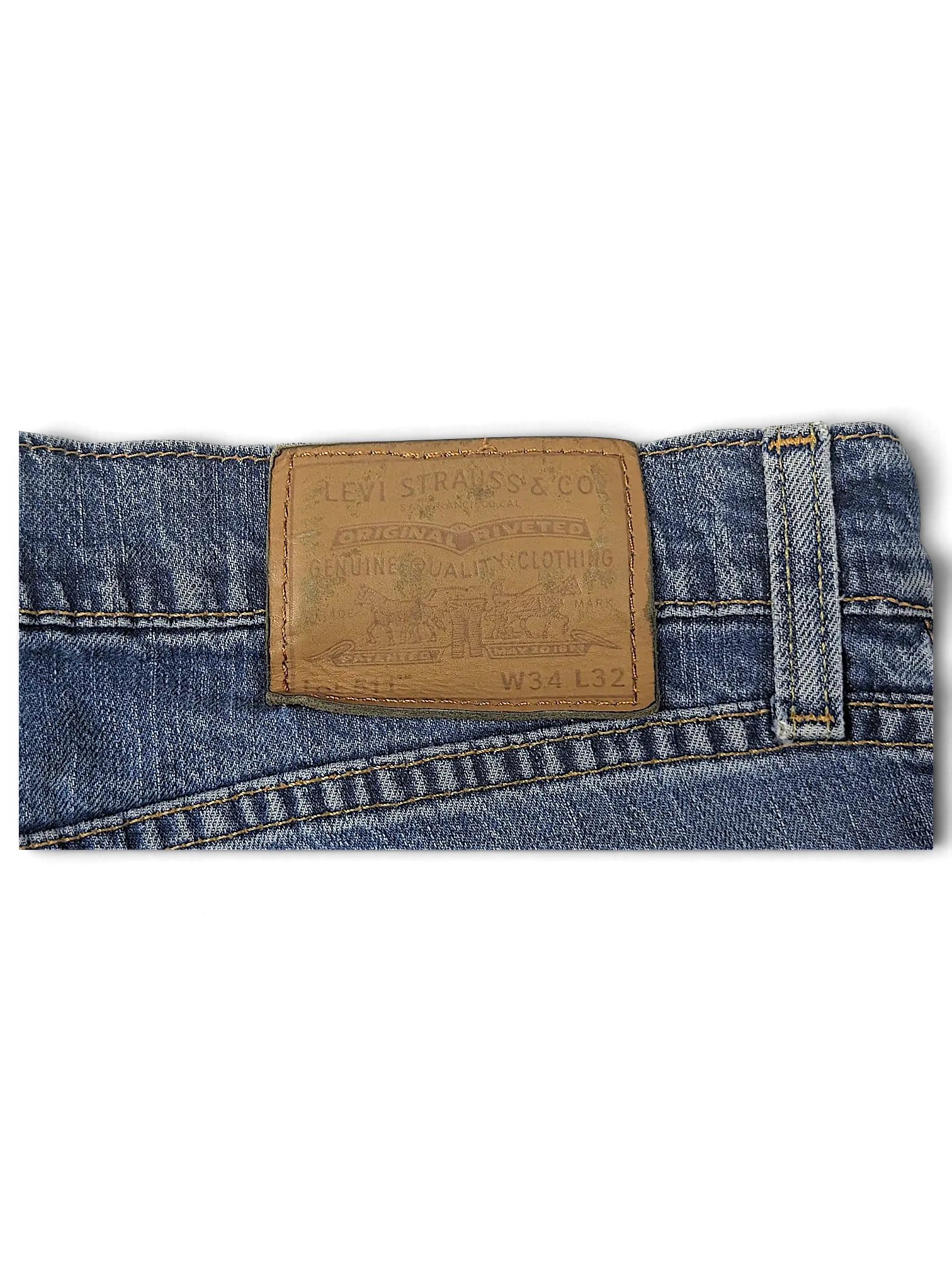JAKE & IPI Levi's 511 blue denim jeans featuring a brown leather back waist patch with size W34 L32 details
