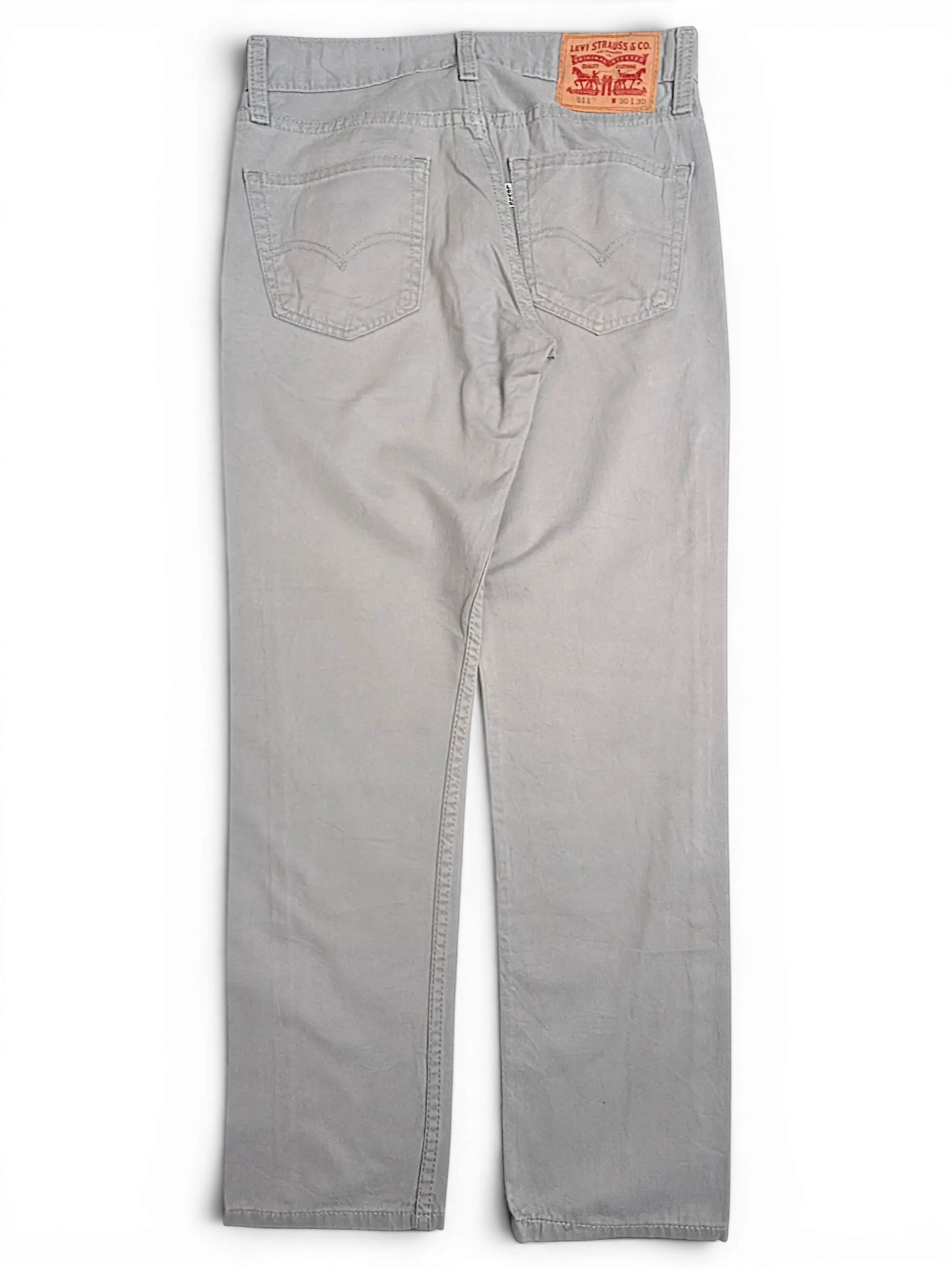 JAKE & IPI Levi's 511 slim fit chino pants in light grey with back pocket detailing and leather brand patch.
