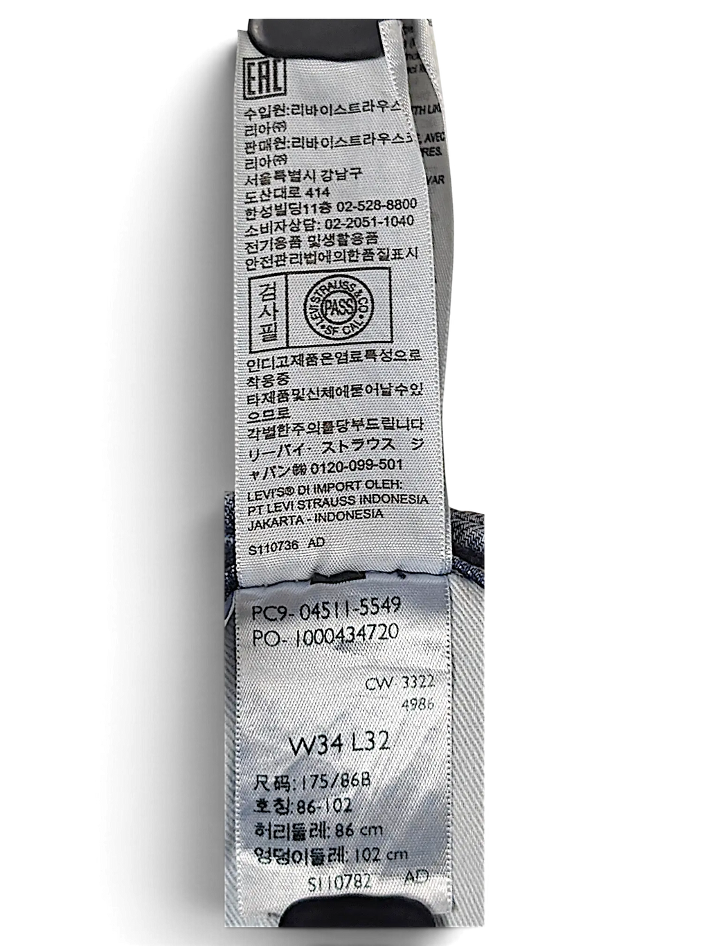 JAKE & IPI Levi's 511 denim jeans interior care label showing size W34 L32 and product information