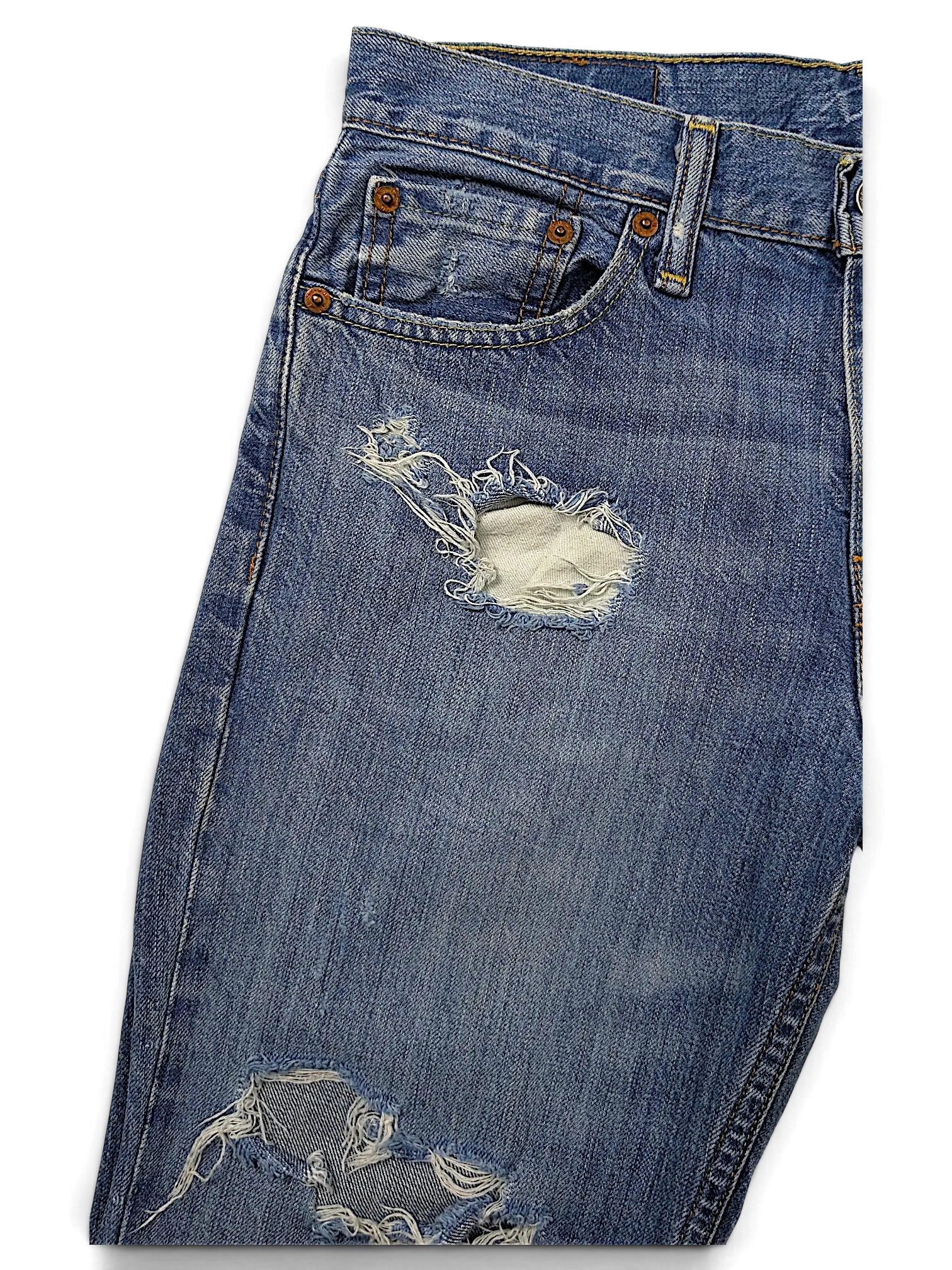 JAKE & IPI Levi's 511 blue denim jeans featuring distressed ripped details on the thigh and knee