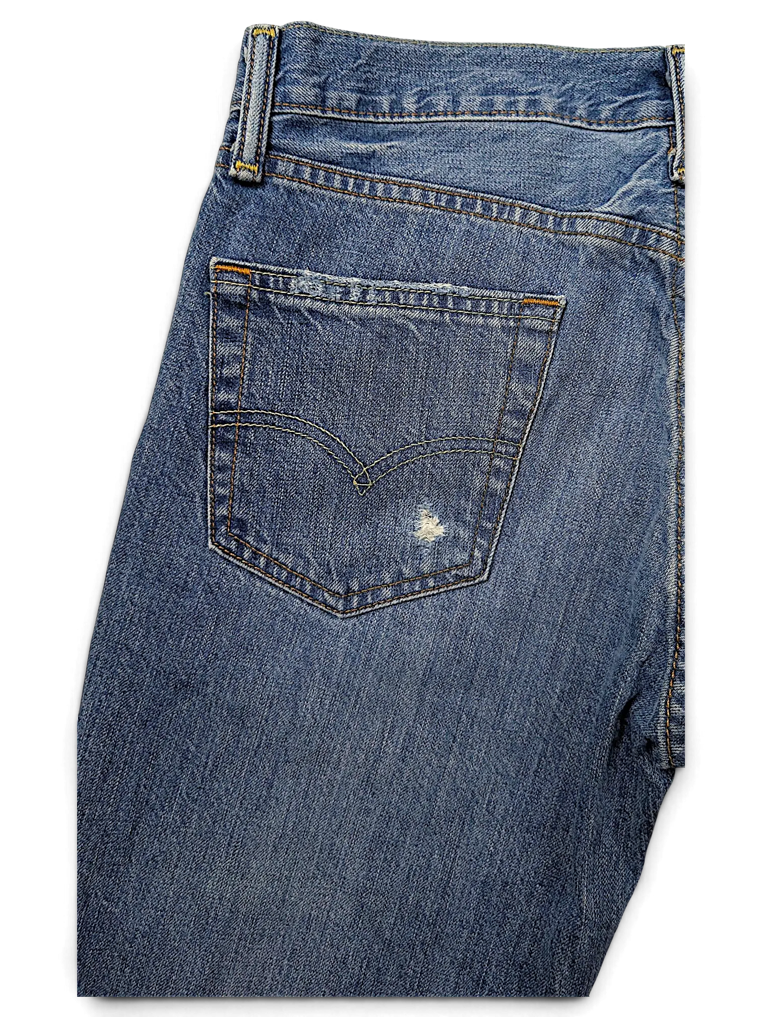 JAKE & IPI Levi's 511 blue denim jeans featuring a back pocket with subtle distressing and signature arcuate stitching.