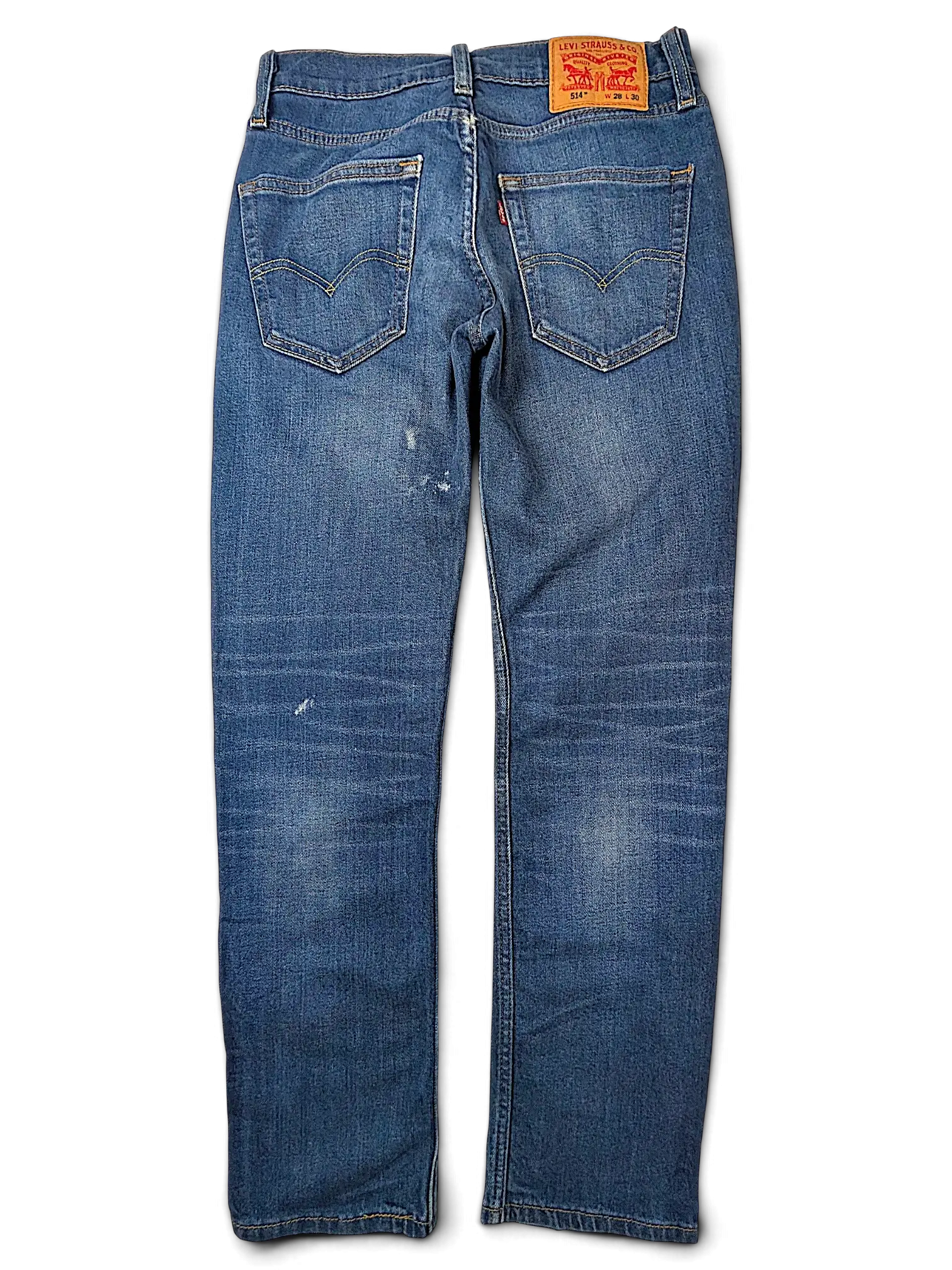 JAKE & IPI Levi's 514 straight leg blue denim jeans with back pockets and leather brand patch on black background