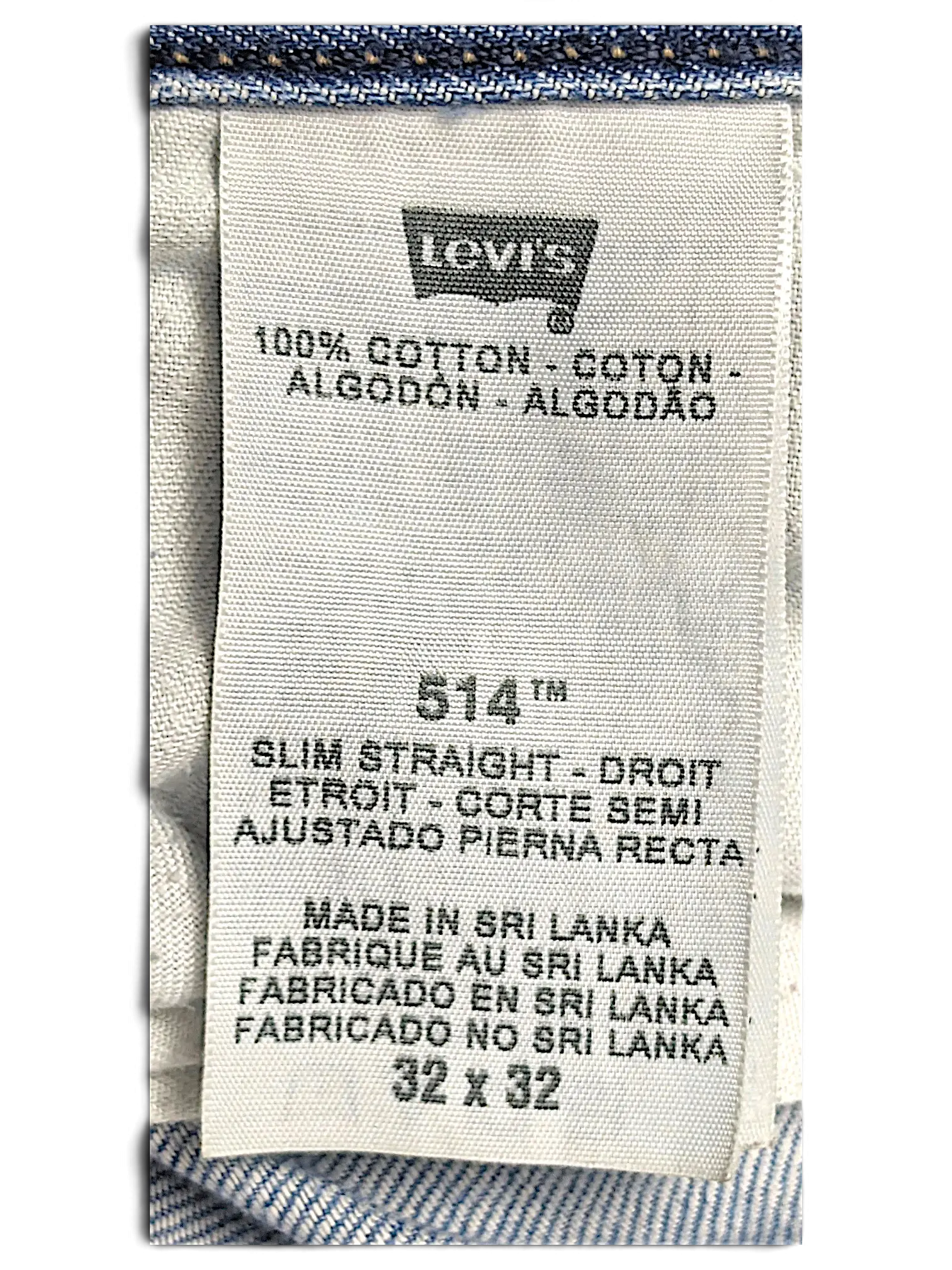 JAKE & IPI Levi's 514 slim straight jeans care tag showing 100 percent cotton material and size 32x32