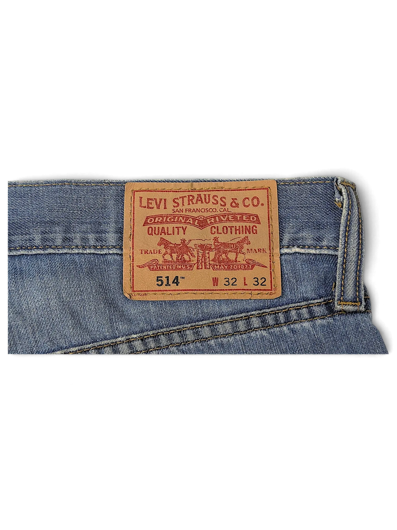 JAKE & IPI Levi's 514 jeans featuring a classic tan leather brand patch on the back waistband