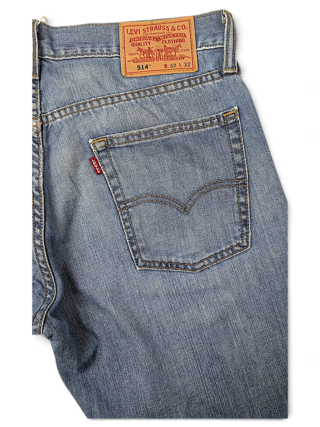 JAKE & IPI Levi's 514 light wash denim jeans featuring a classic five-pocket design and leather back patch.