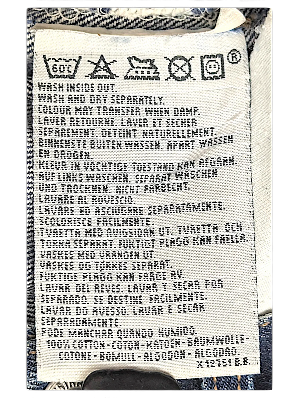 JAKE & IPI Levi's 555 jeans care label showing 100 percent cotton composition and washing instructions