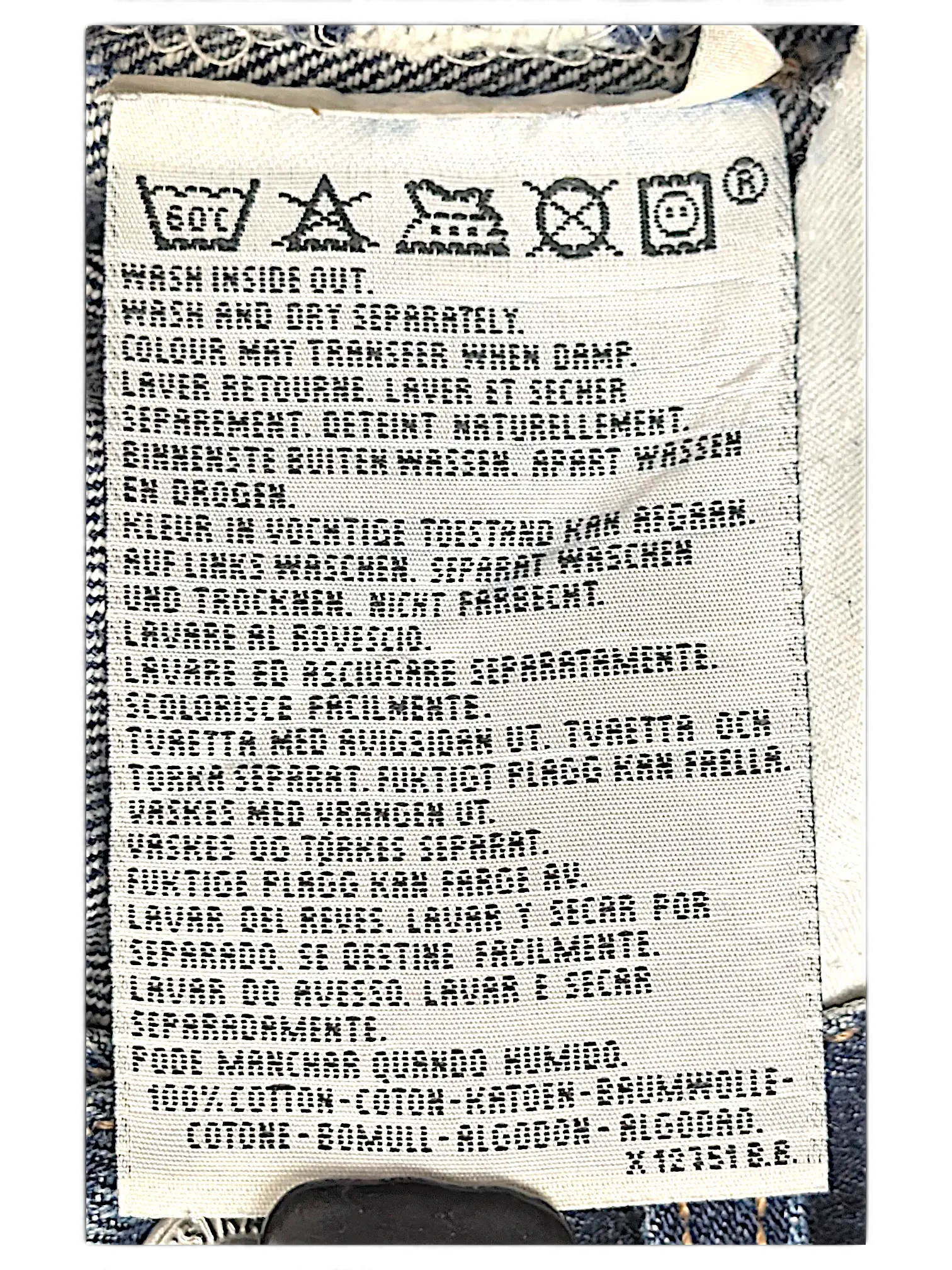 JAKE & IPI Levi's 555 jeans care label showing 100 percent cotton composition and washing instructions