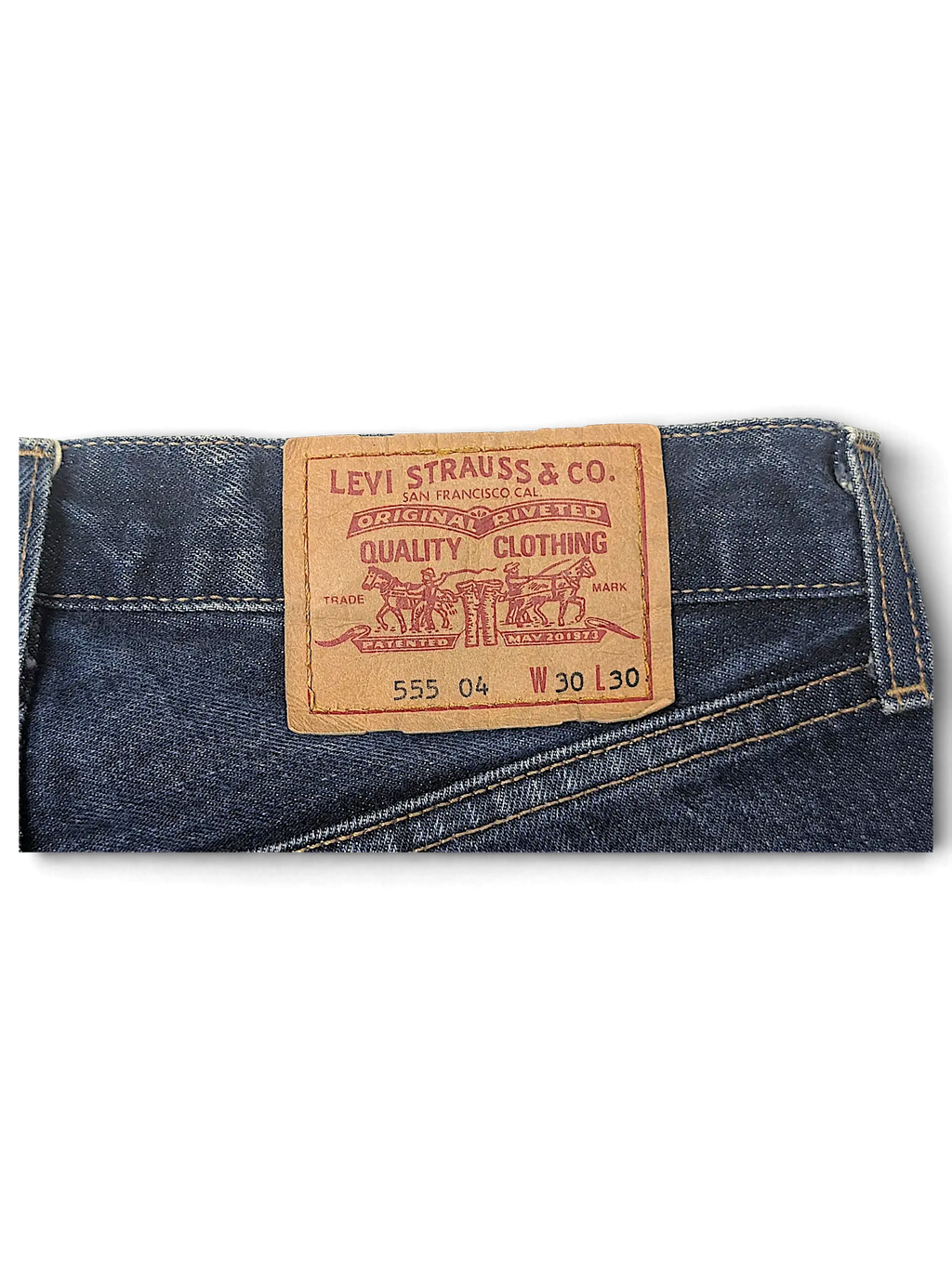 JAKE & IPI Levi's 555 denim jeans featuring a classic tan leather back waist patch with size W30 L30 details.