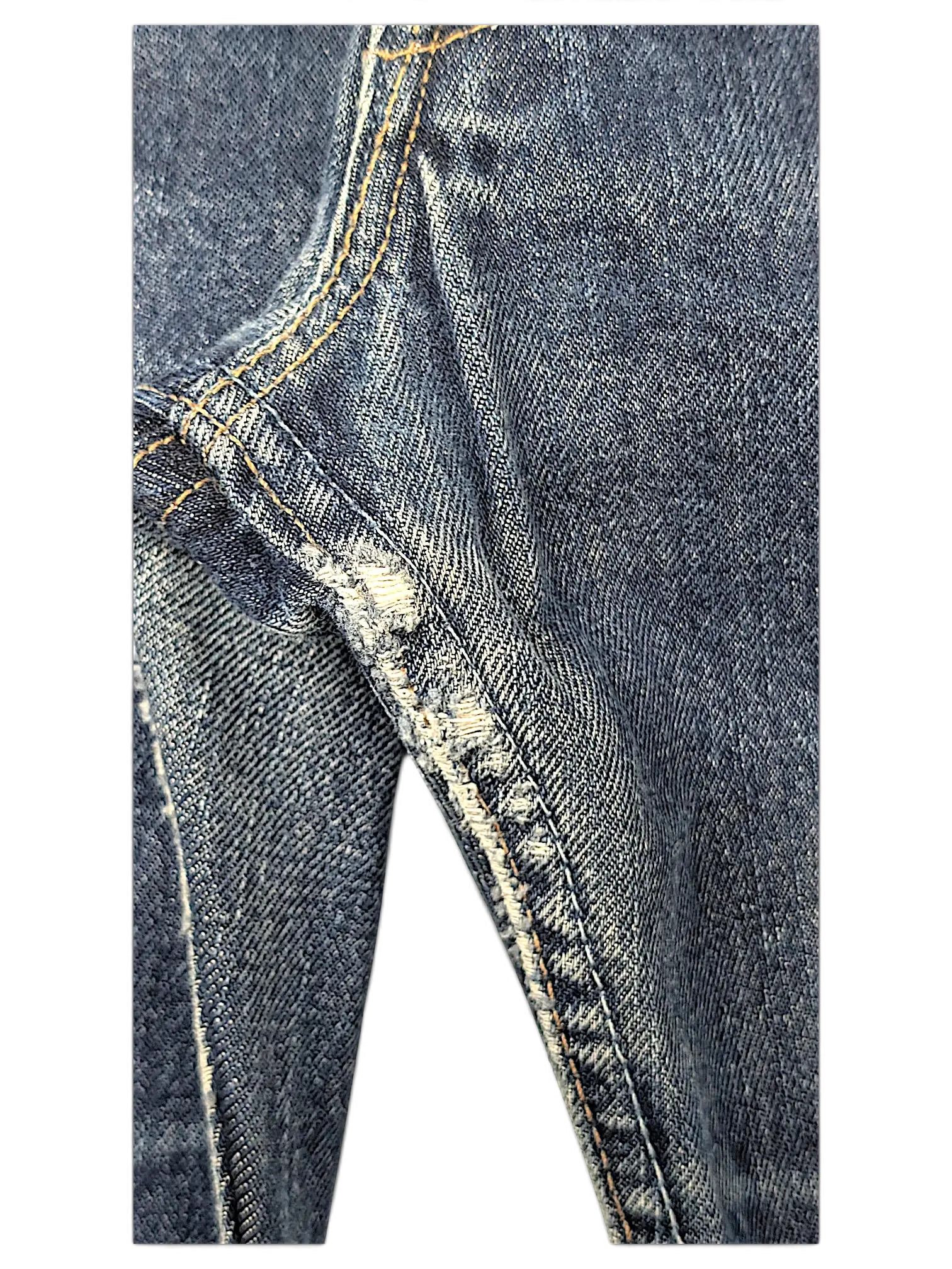 JAKE & IPI Levi's 555 blue denim jeans showing close-up detail of the inner thigh seam wear and stitching.