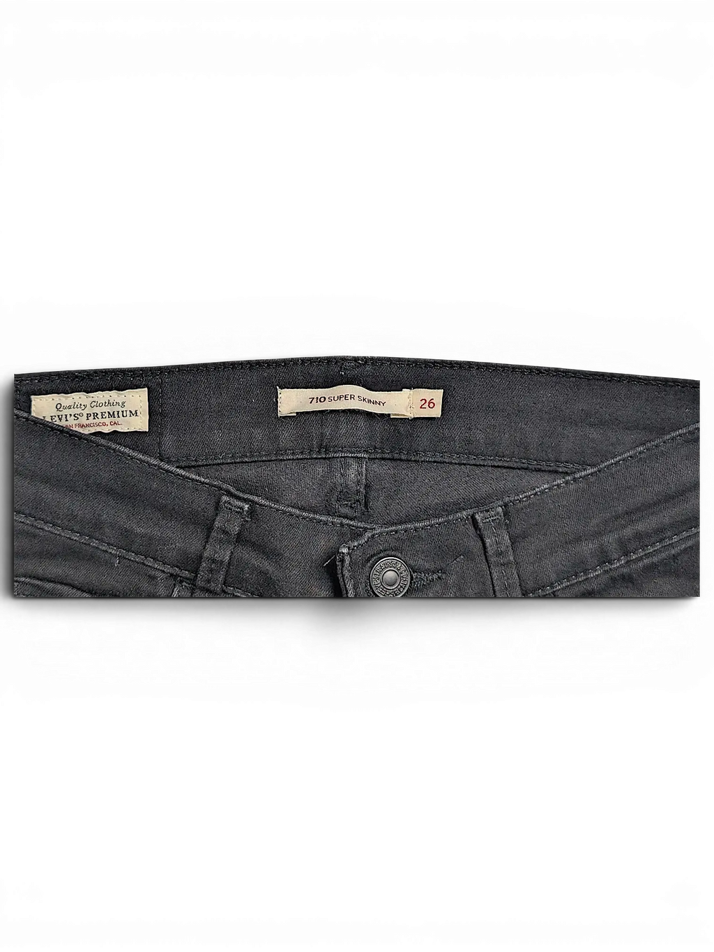 JAKE & IPI Levi's 710 Super Skinny jeans in black with branded waist label and button detail