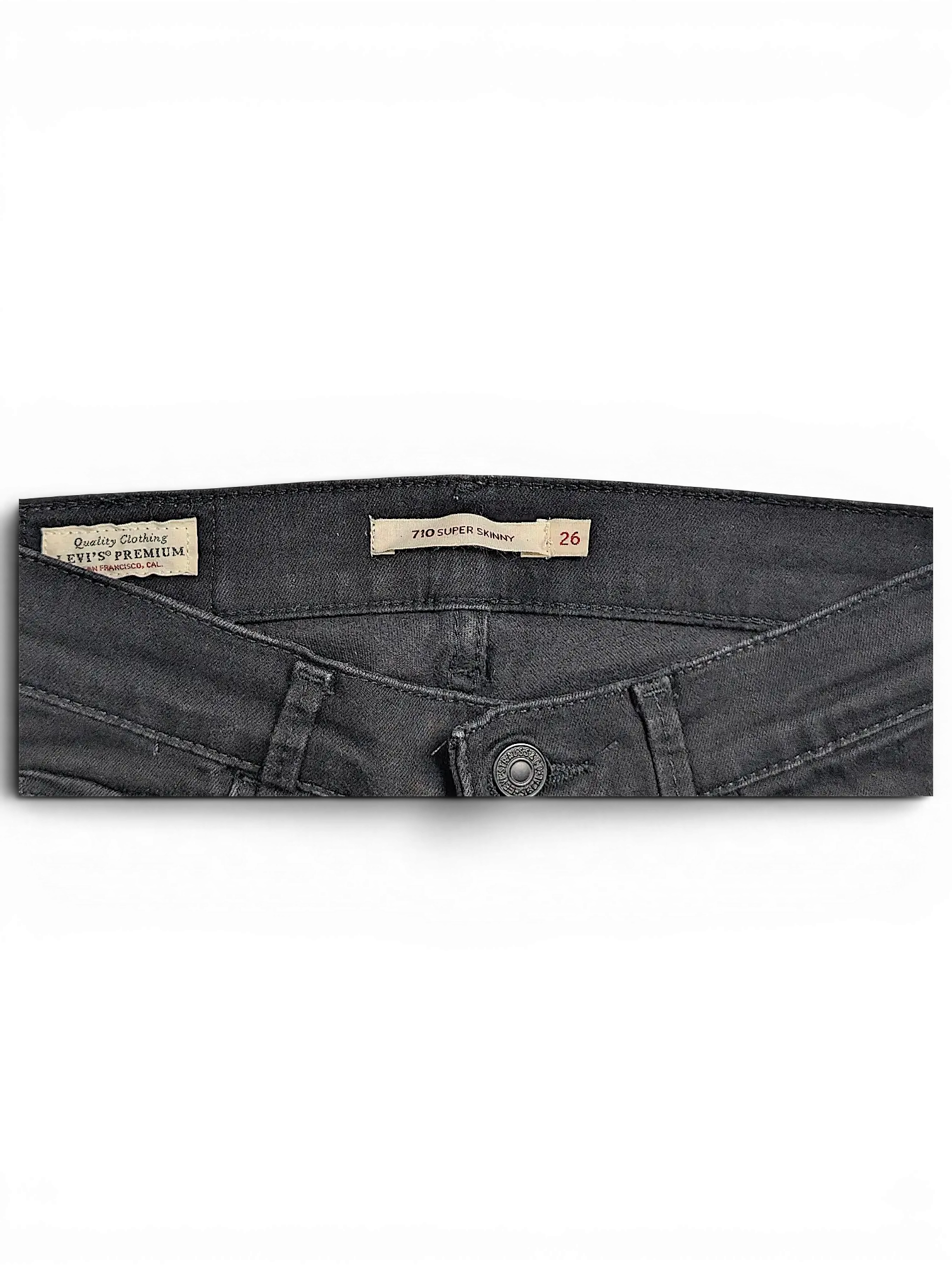 JAKE & IPI Levi's 710 Super Skinny jeans in black with branded waist label and button detail