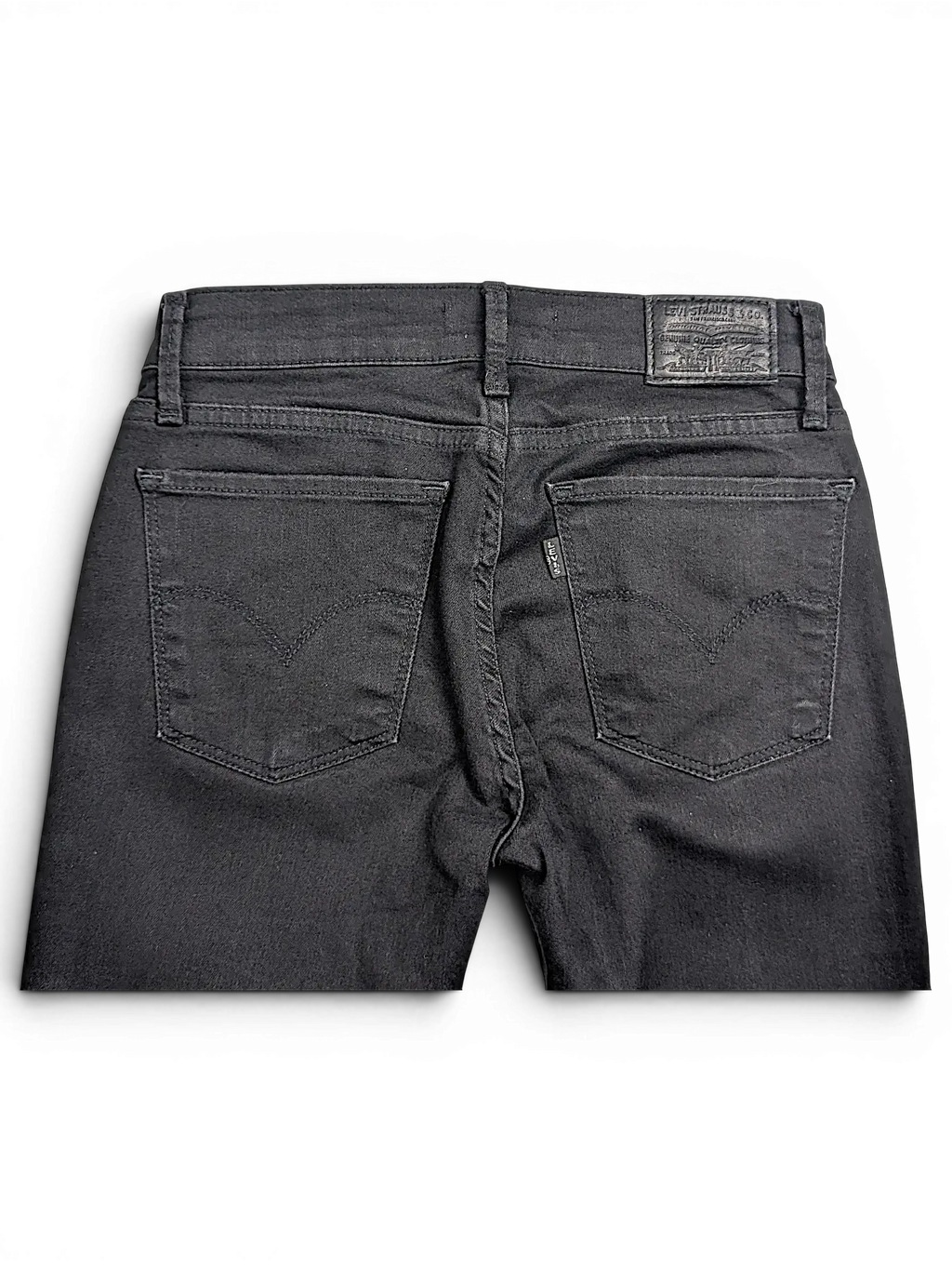 JAKE & IPI Levi's 710 super skinny black denim jeans featuring back pockets and a leather brand patch.
