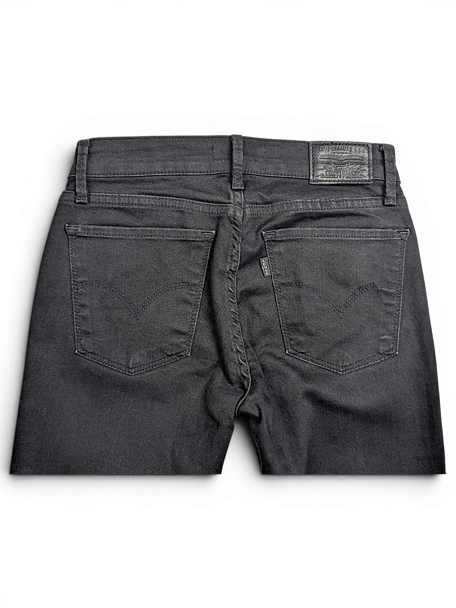 JAKE & IPI Levi's 710 super skinny black denim jeans featuring back pockets and a leather brand patch.