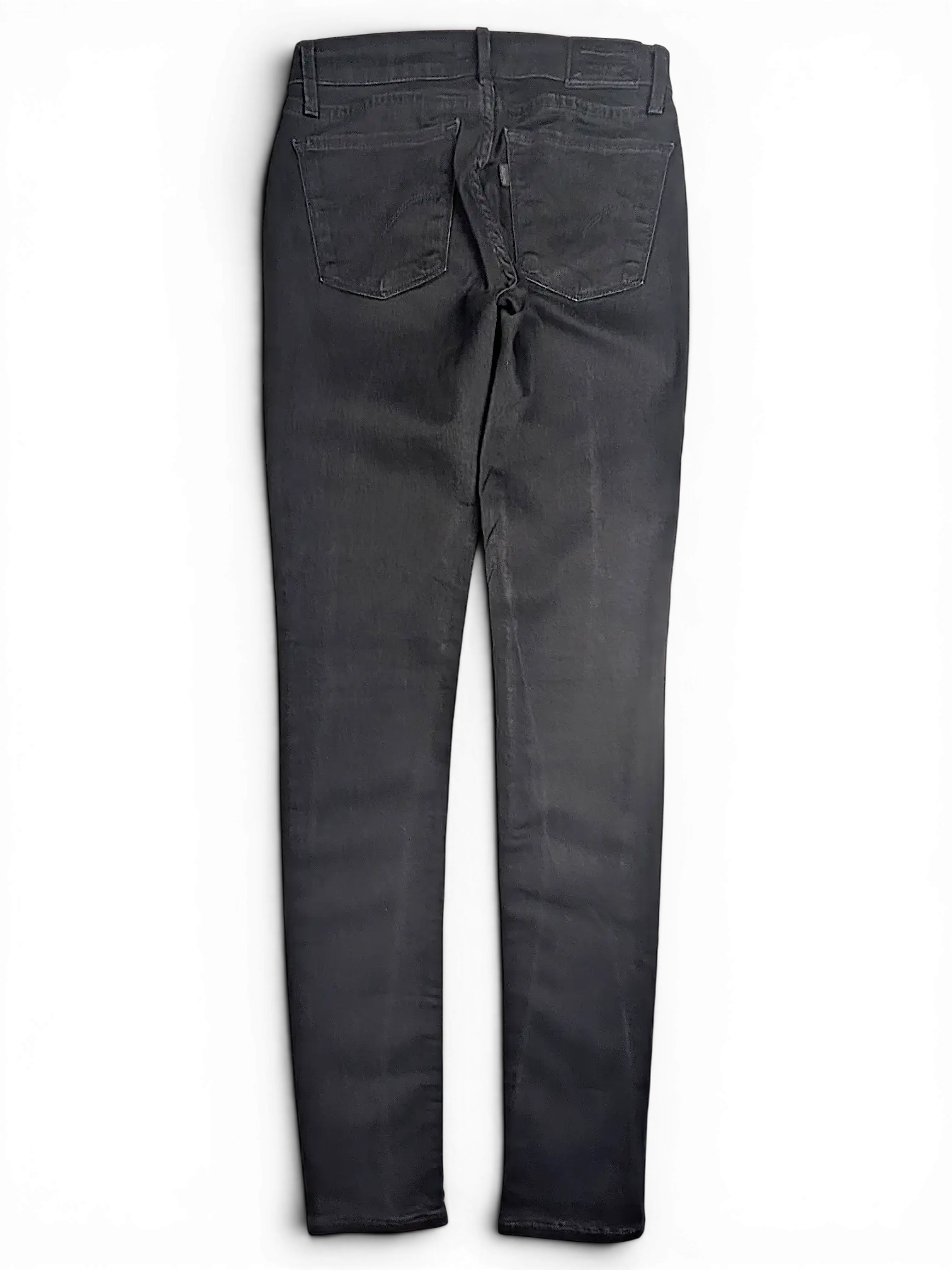 JAKE & IPI Levi's 710 super skinny black denim jeans, back view showing pockets and belt loops.