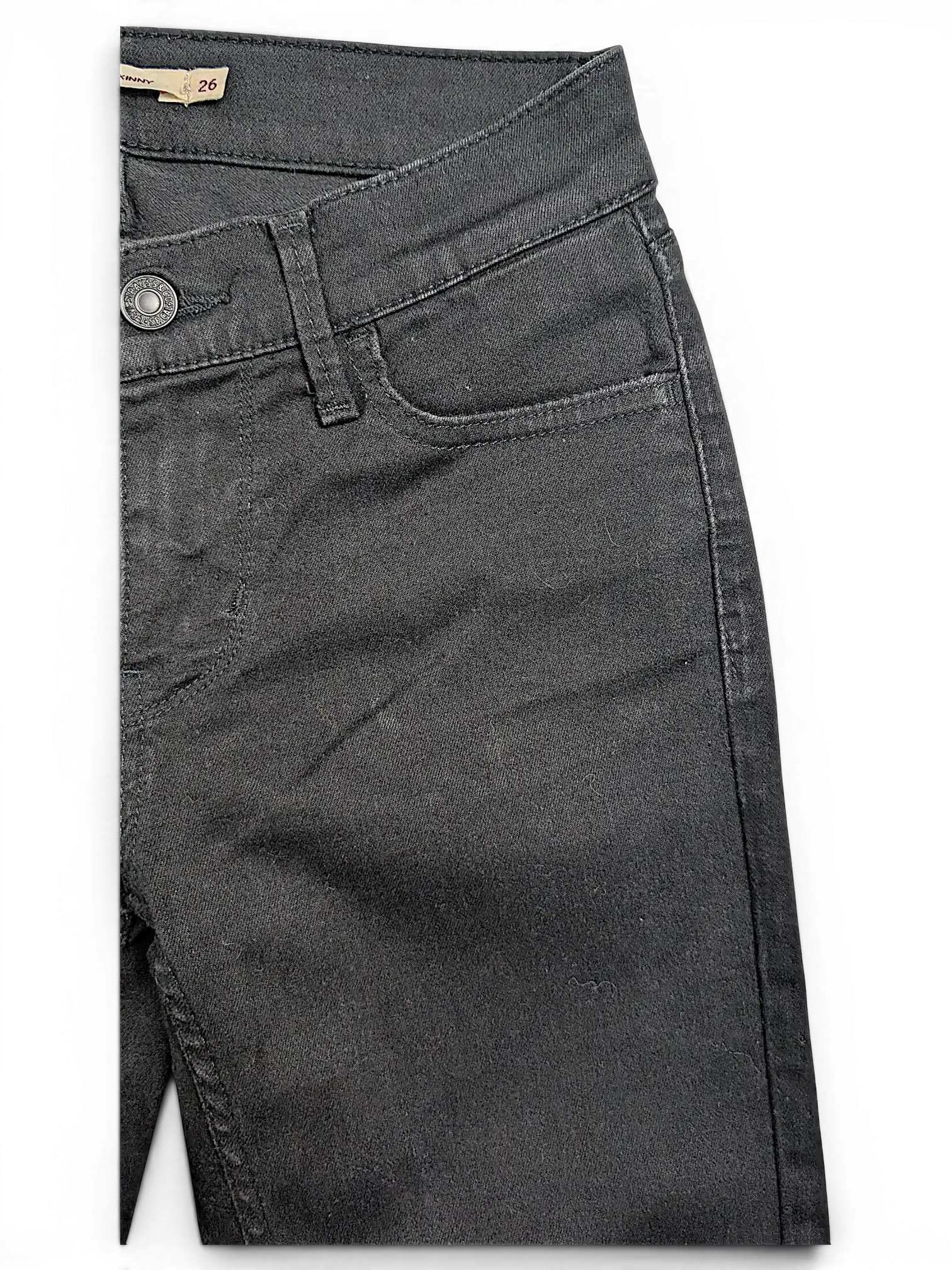 JAKE & IPI Levi's 710 super skinny black denim jeans featuring a classic button fly and front pocket detail.