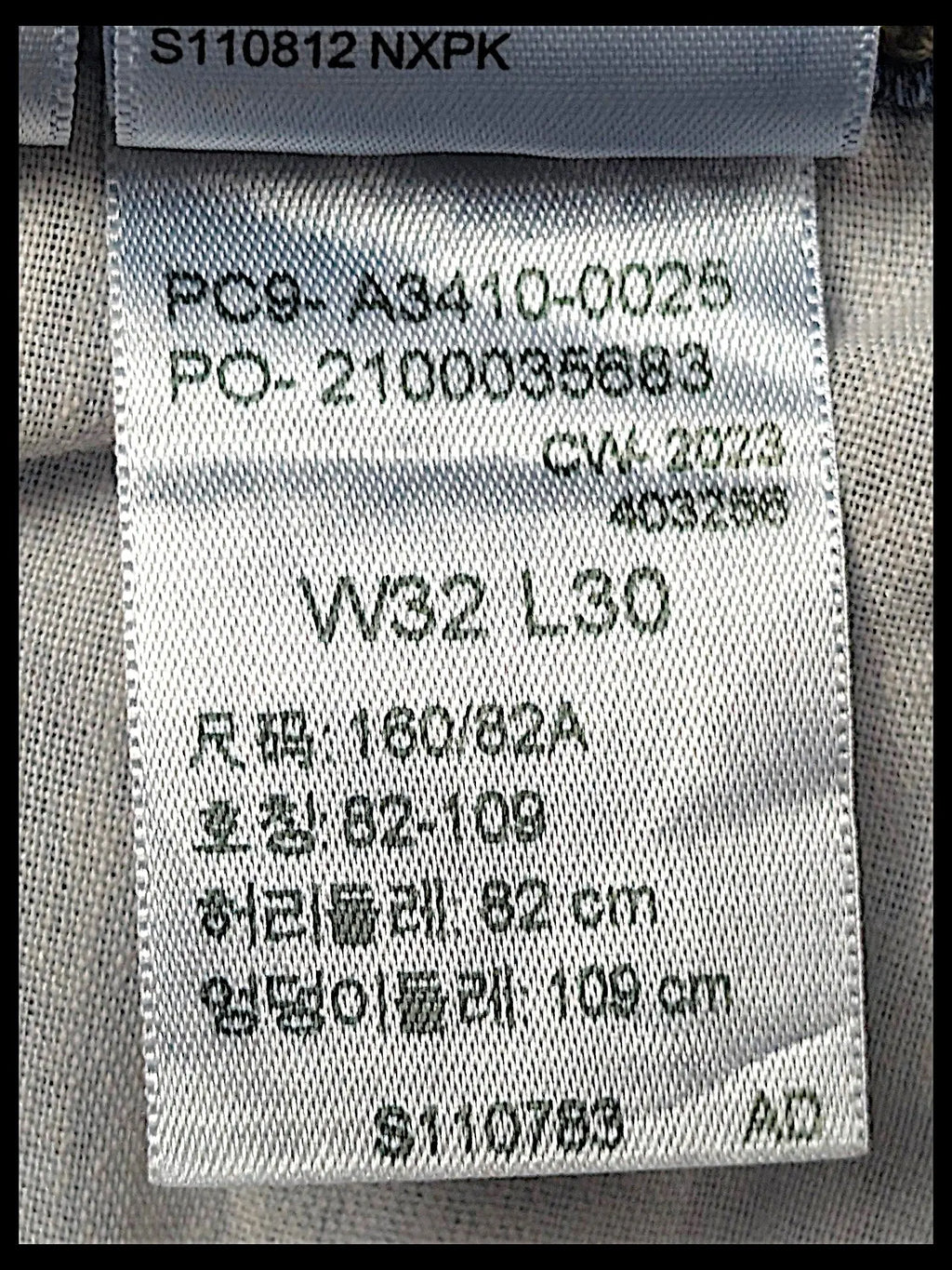 JAKE & IPI Levi's 726 flare jeans interior care label showing size W32 L30 and product code details