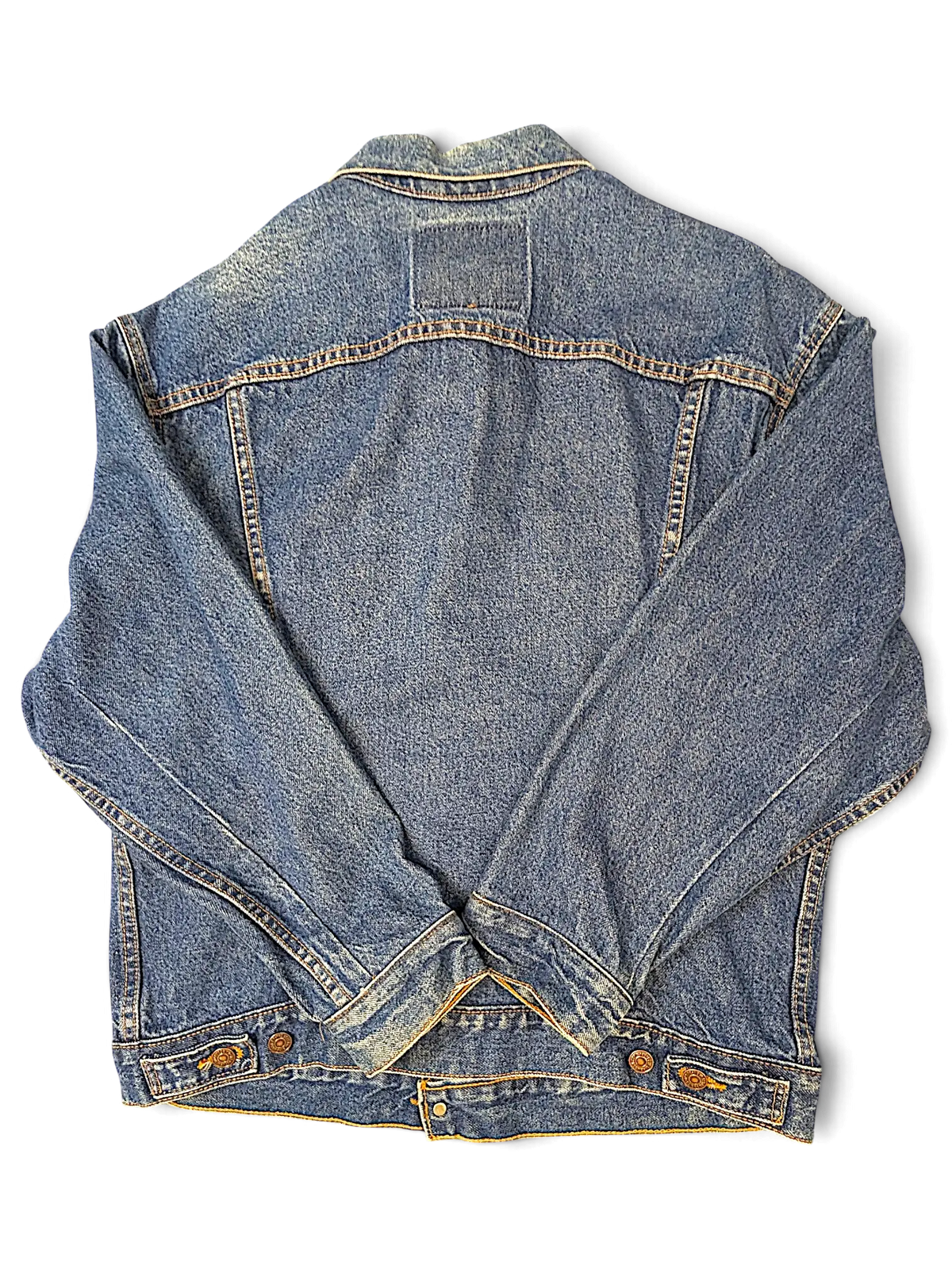 Back view of a JAKE & IPI Levi's tagless blue denim jacket with classic stitching and buttoned cuffs