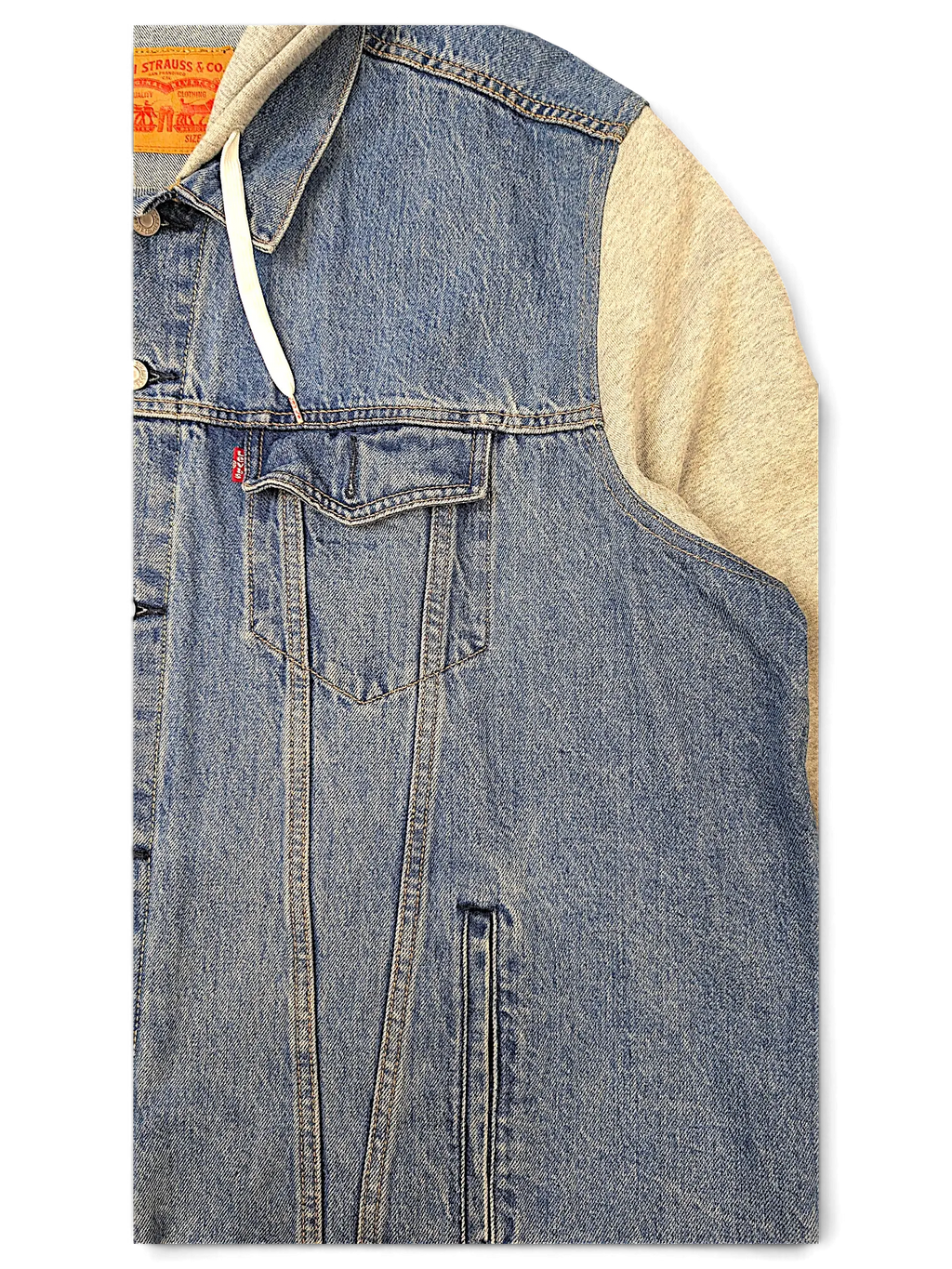 JAKE & IPI Levi's denim jacket featuring blue cotton denim body, grey jersey hood, and classic chest pockets.