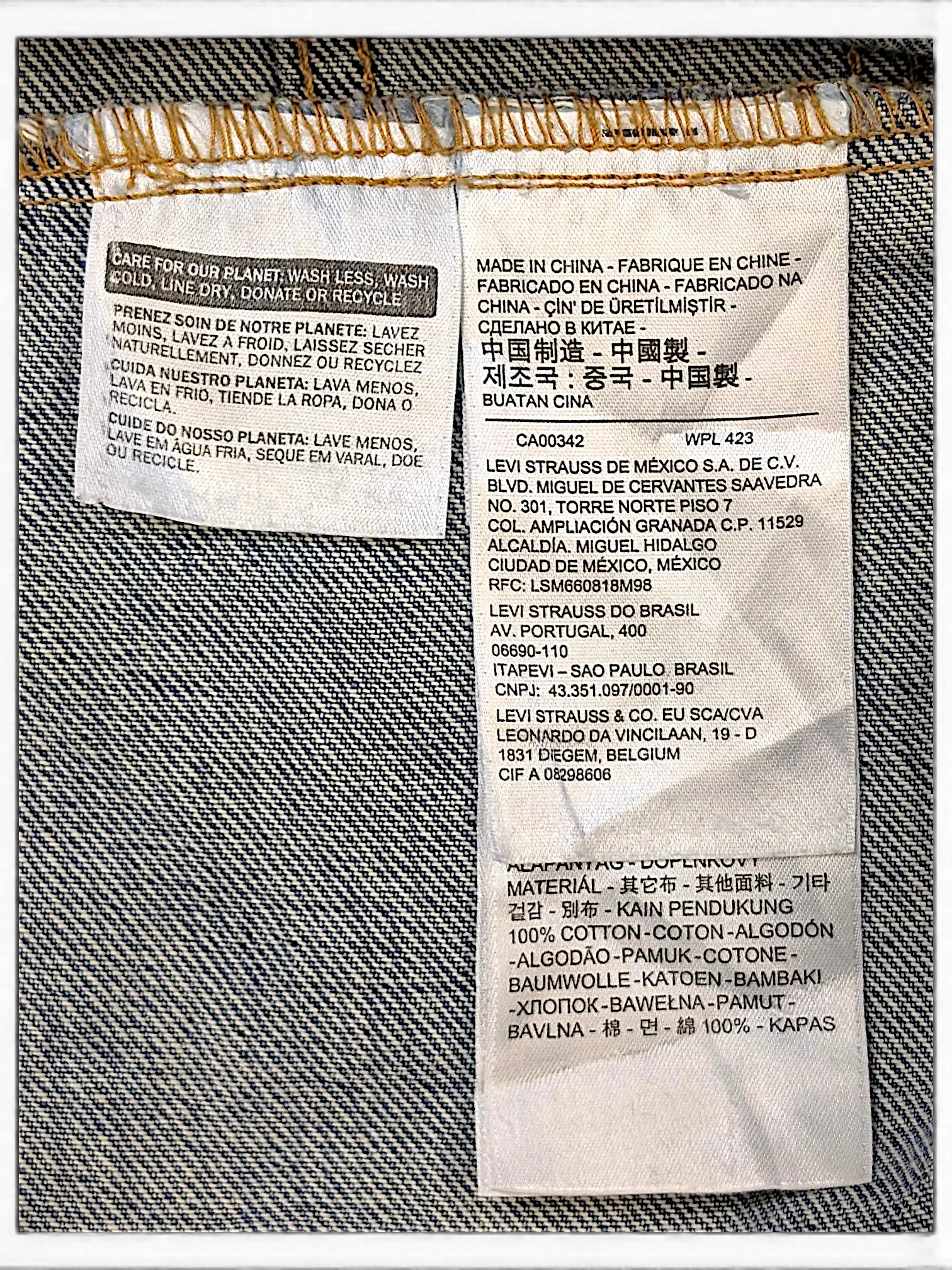 JAKE & IPI Levi's denim jacket interior care and material label showing 100% cotton composition