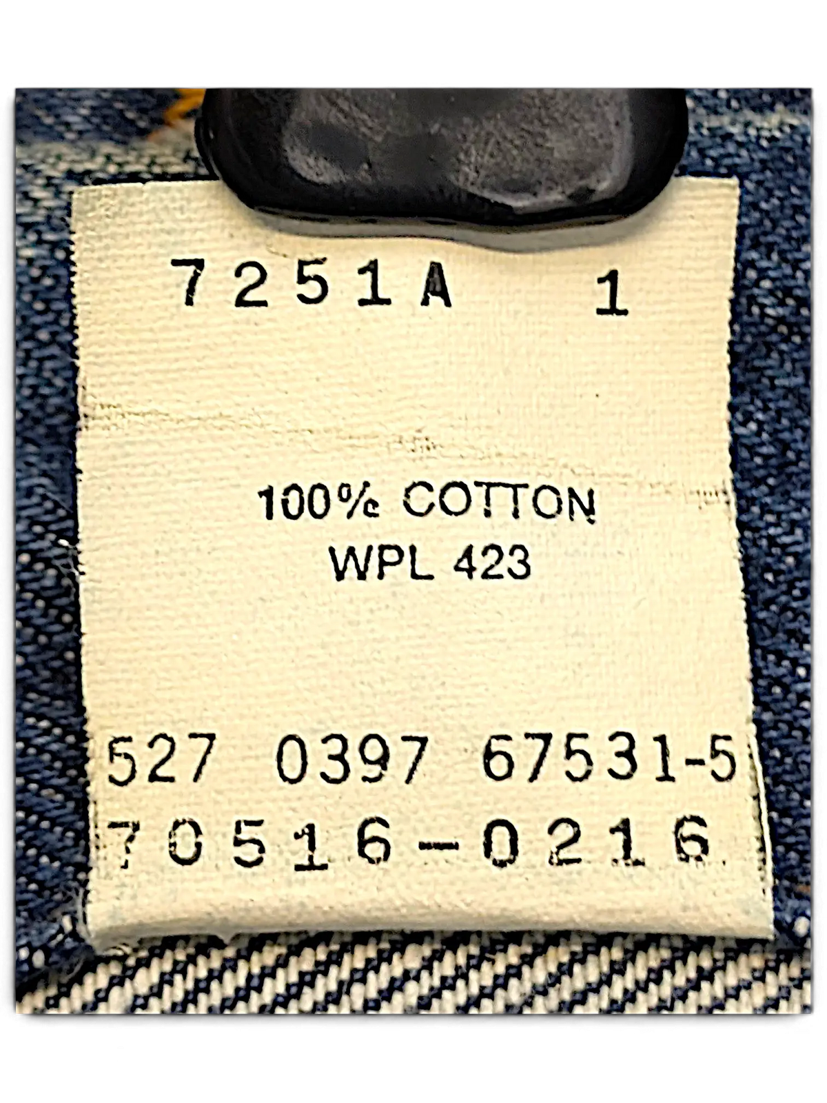 JAKE & IPI Levi's denim jacket interior care label showing 100 percent cotton material and product codes