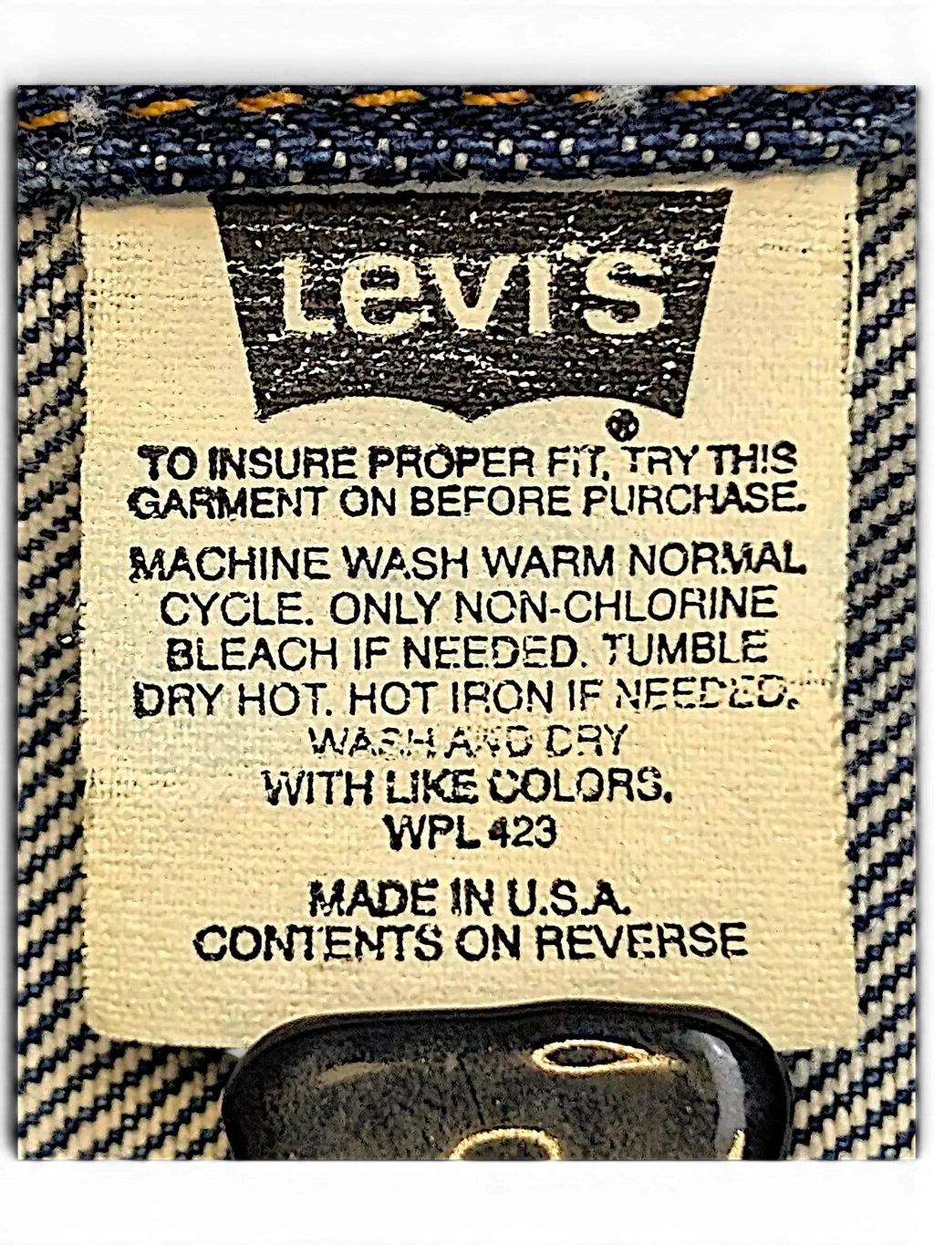 JAKE & IPI Levi's denim jacket interior care label with washing instructions and USA origin details