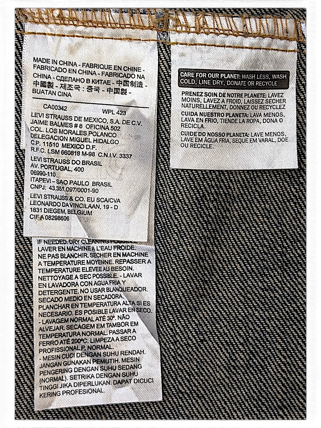 JAKE & IPI Levi's denim vest garment care label with washing instructions and manufacturing details