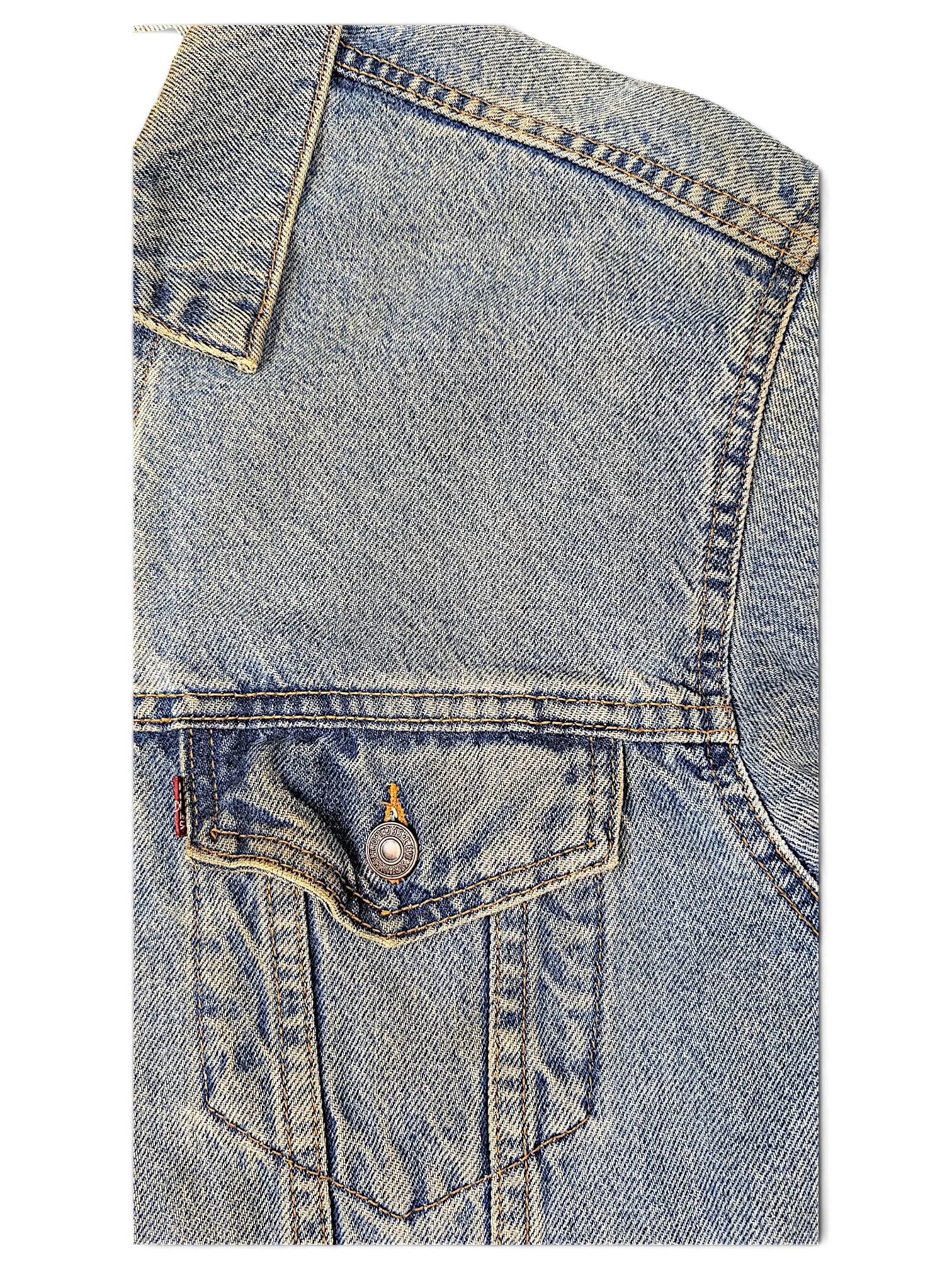 JAKE & IPI Levi's Strauss distressed light blue denim jacket with a buttoned chest pocket and classic stitching.