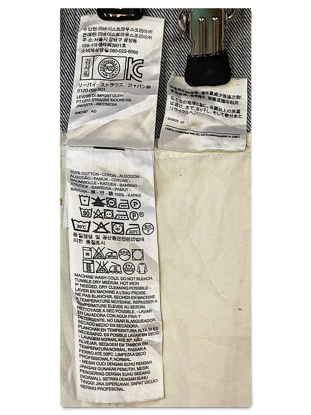 JAKE & IPI Levi's Strauss girls jacket internal care and material composition labels with washing instructions