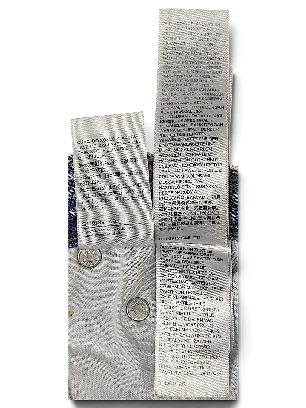 JAKE & IPI Levi's jeans interior care and material composition labels with five-pocket denim construction detail